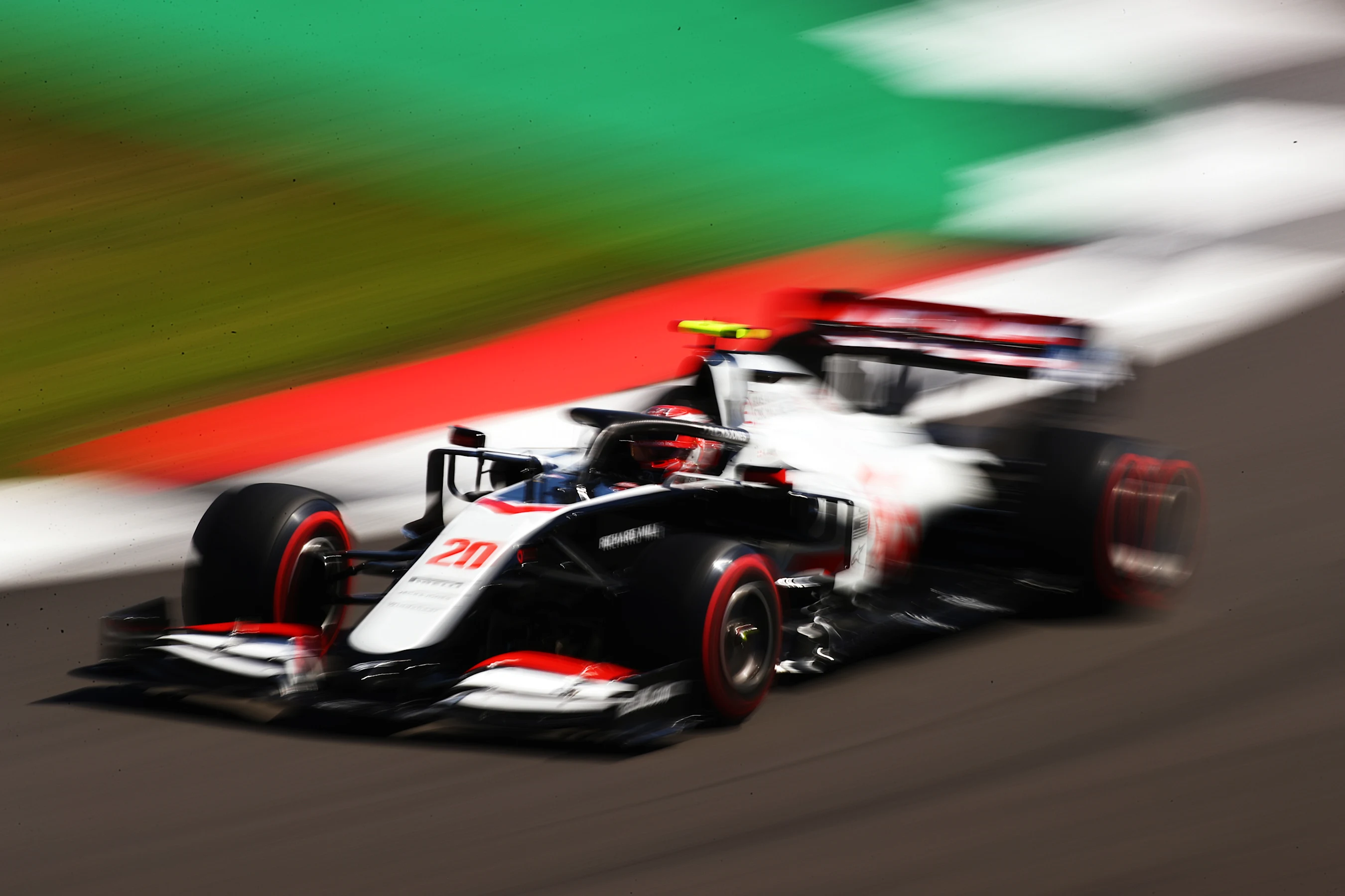 NORTHAMPTON, ENGLAND - AUGUST 07: Kevin Magnussen of Denmark driving the (20) Haas F1 Team VF-20