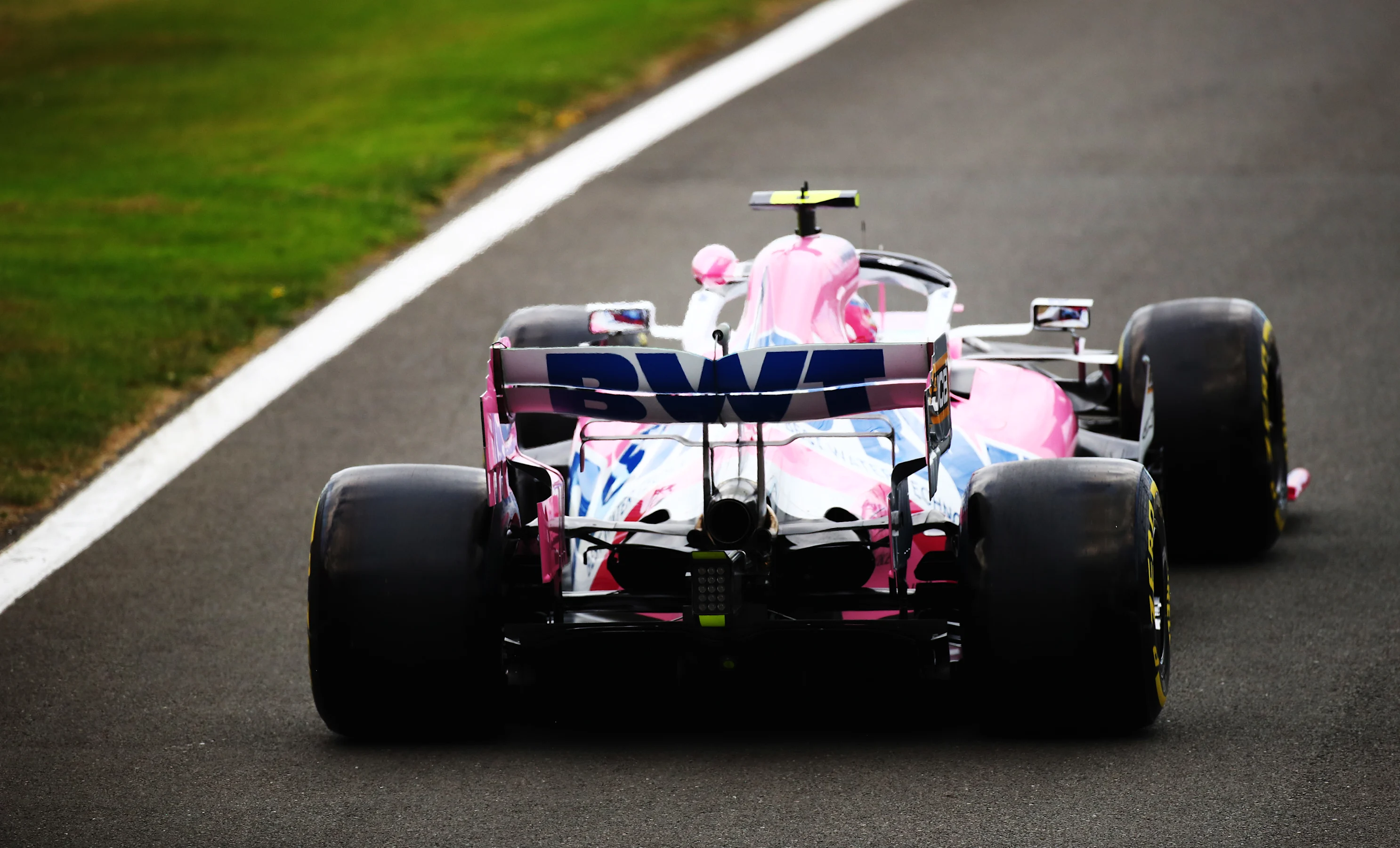 NORTHAMPTON, ENGLAND - AUGUST 07: Lance Stroll of Canada driving the (18) Racing Point RP20
