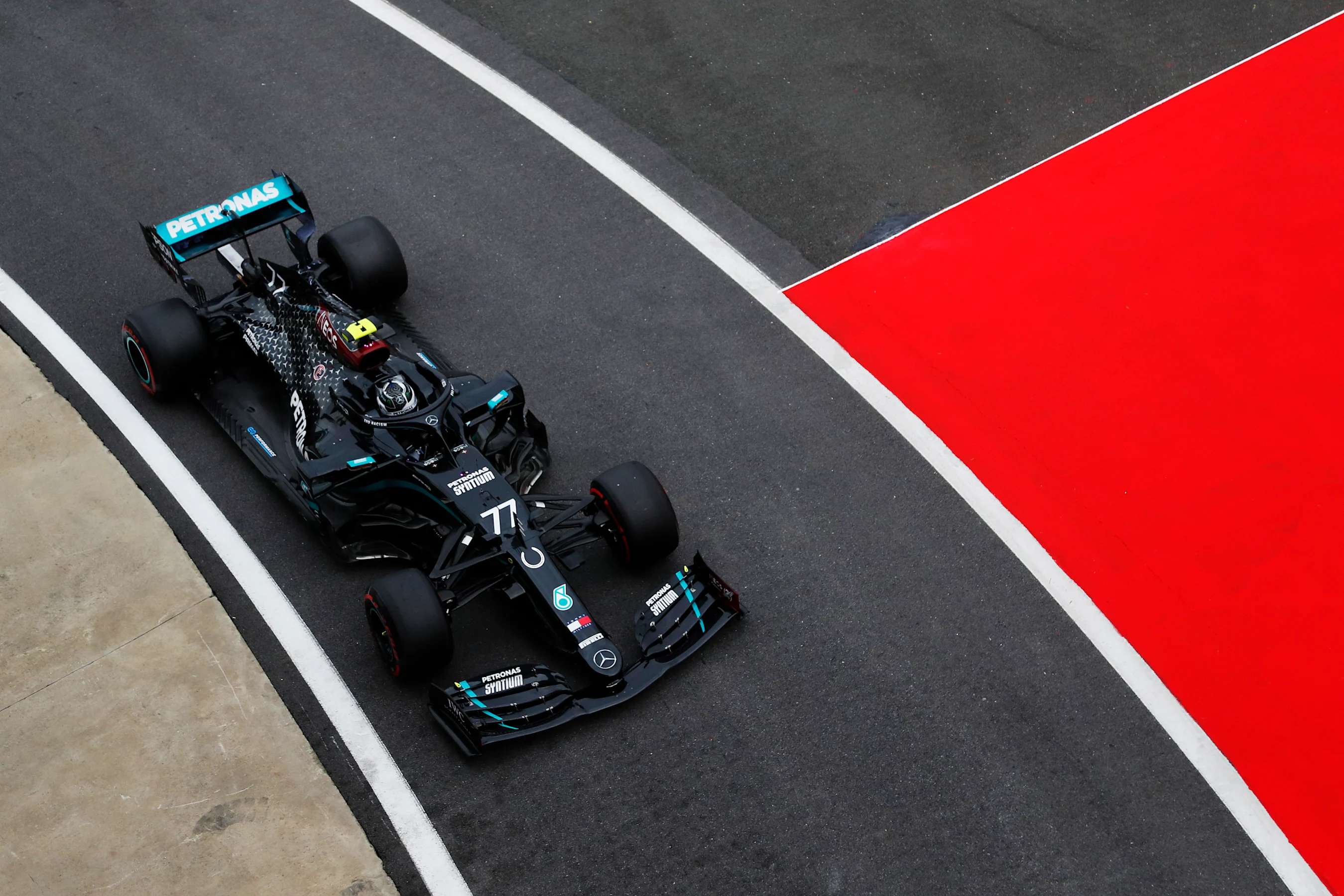NORTHAMPTON, ENGLAND - AUGUST 07: Valtteri Bottas of Finland driving the (77) Mercedes AMG Petronas