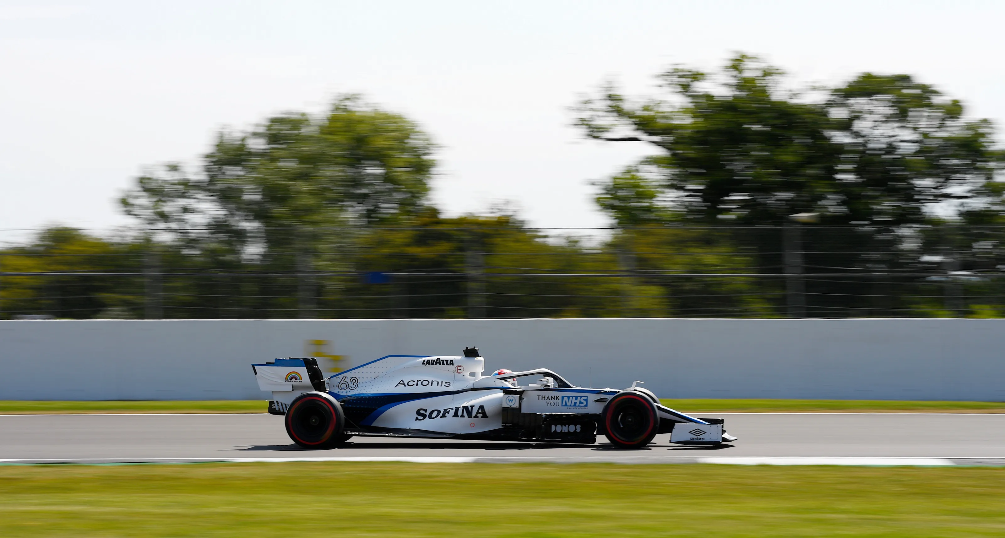 NORTHAMPTON, ENGLAND - AUGUST 08: George Russell of Great Britain driving the (63) Williams Racing
