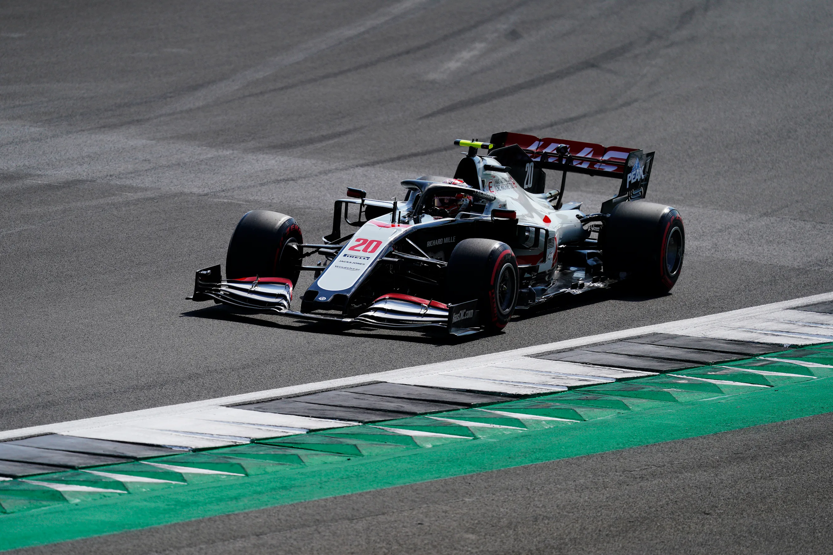 NORTHAMPTON, ENGLAND - AUGUST 08: Kevin Magnussen of Denmark driving the (20) Haas F1 Team VF-20