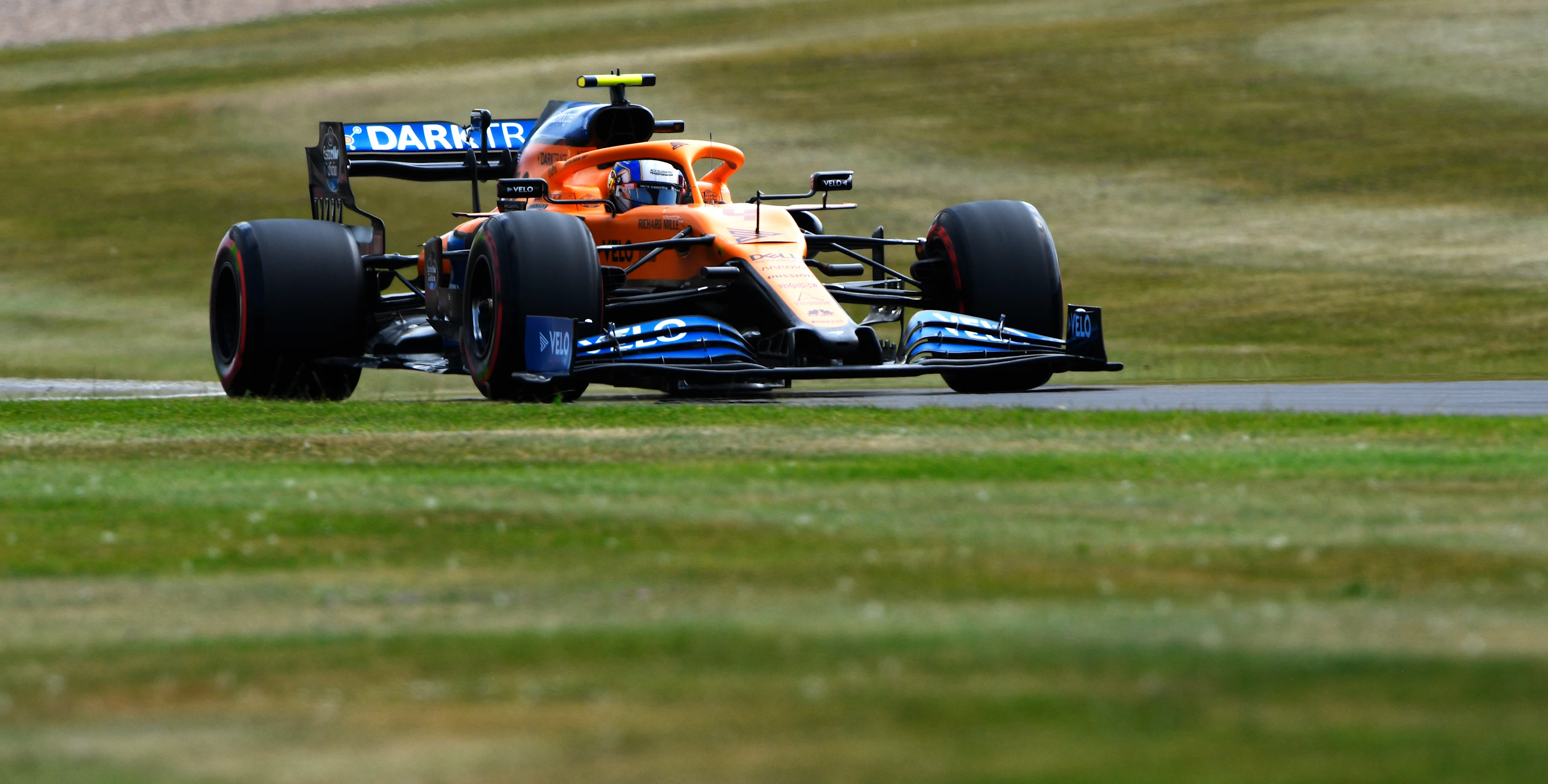 NORTHAMPTON, ENGLAND - AUGUST 08: Lando Norris of Great Britain driving the (4) McLaren F1 Team