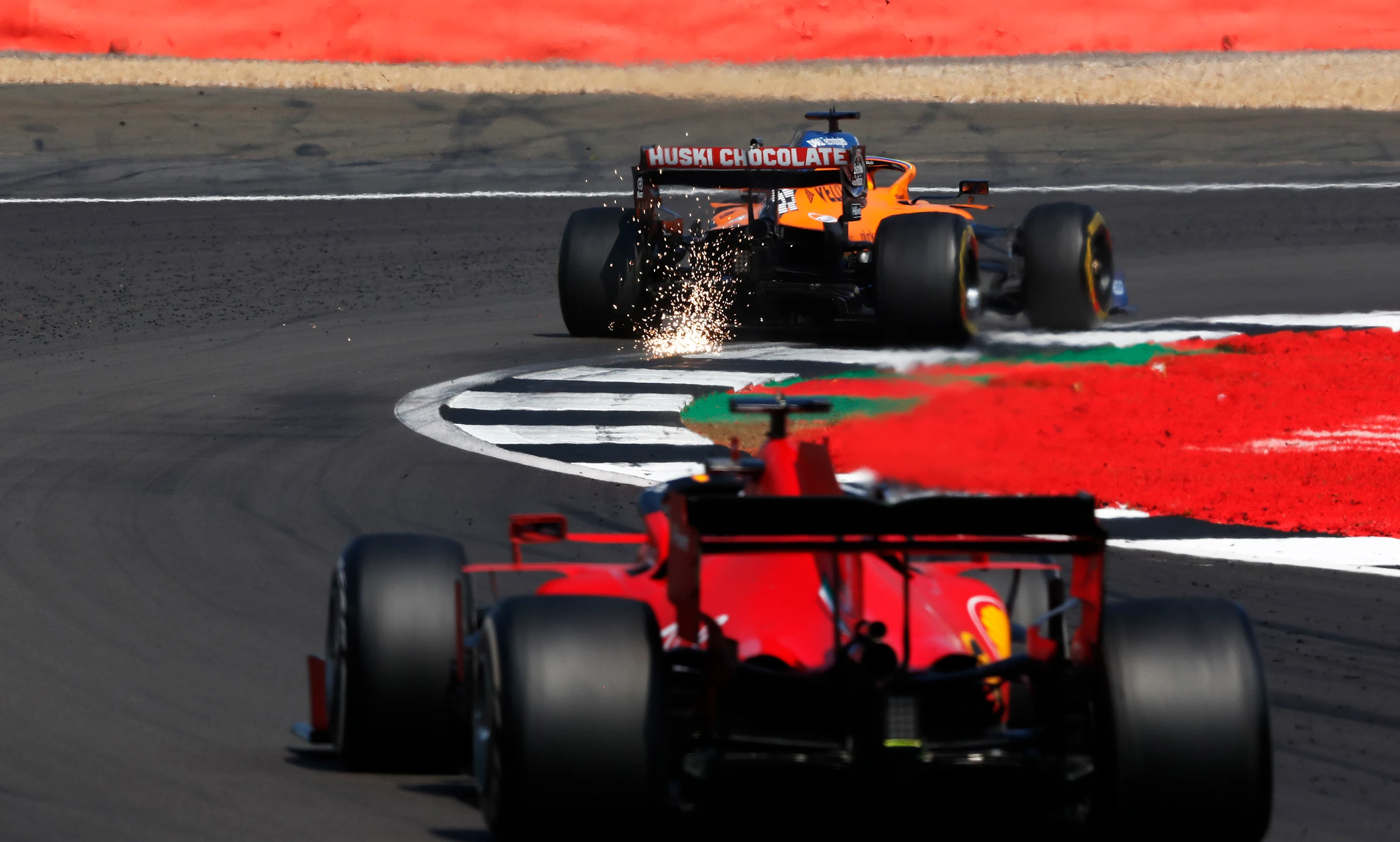 NORTHAMPTON, ENGLAND - AUGUST 09: Carlos Sainz of Spain driving the (55) McLaren F1 Team MCL35