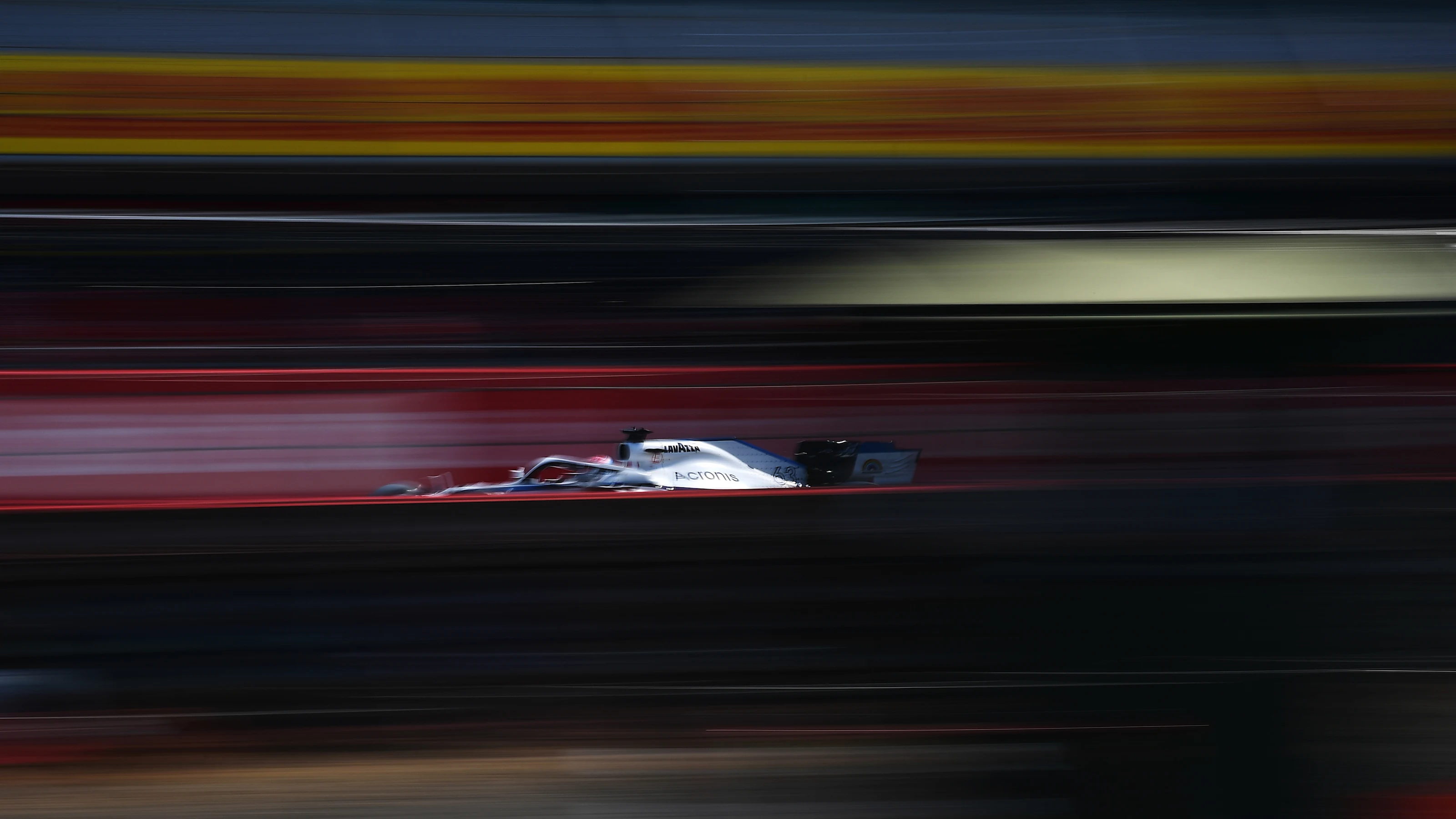 NORTHAMPTON, ENGLAND - AUGUST 09: George Russell of Great Britain driving the (63) Williams Racing