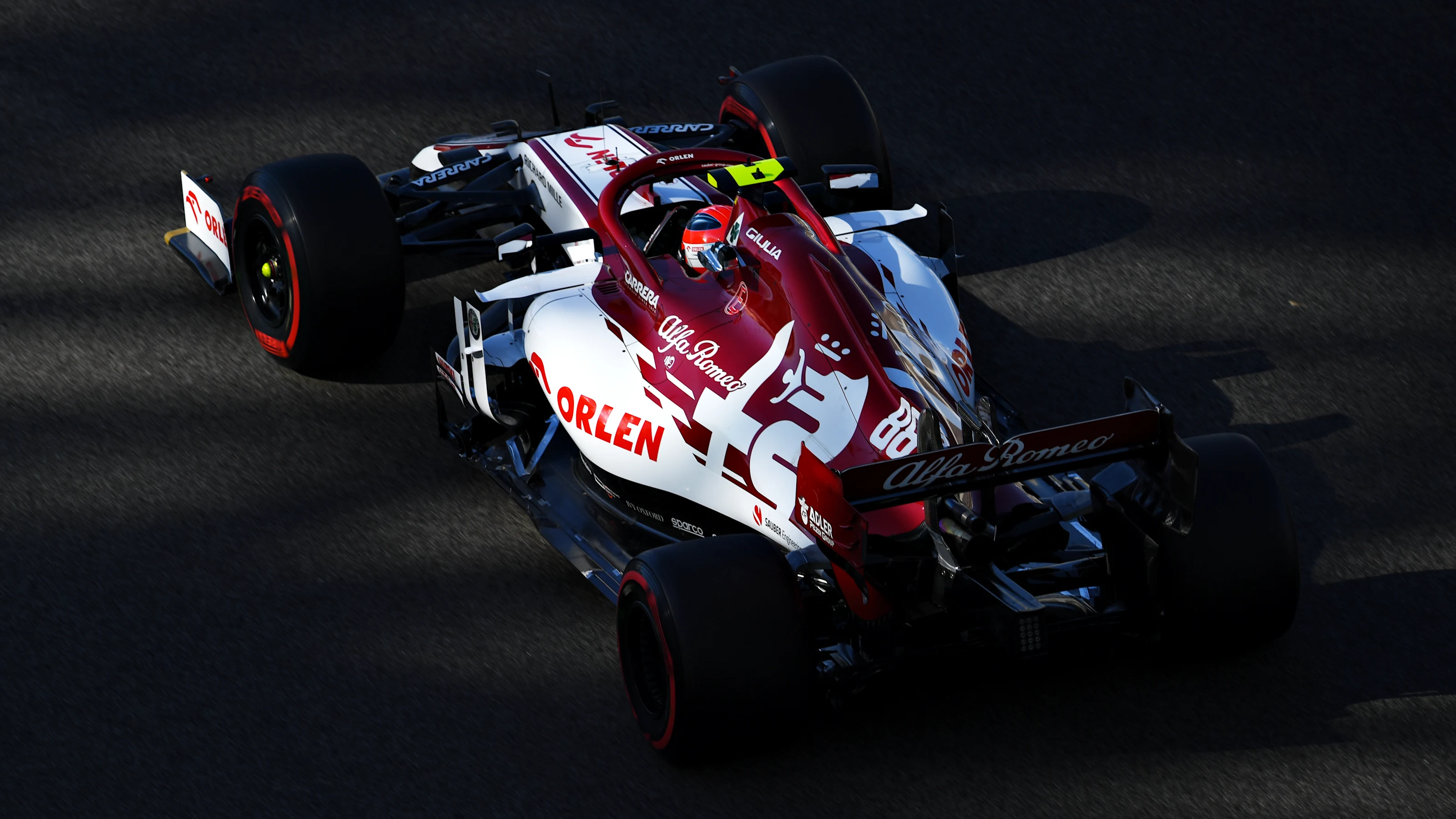 ABU DHABI, UNITED ARAB EMIRATES - DECEMBER 11: Robert Kubica of Poland driving the (88) Alfa Romeo