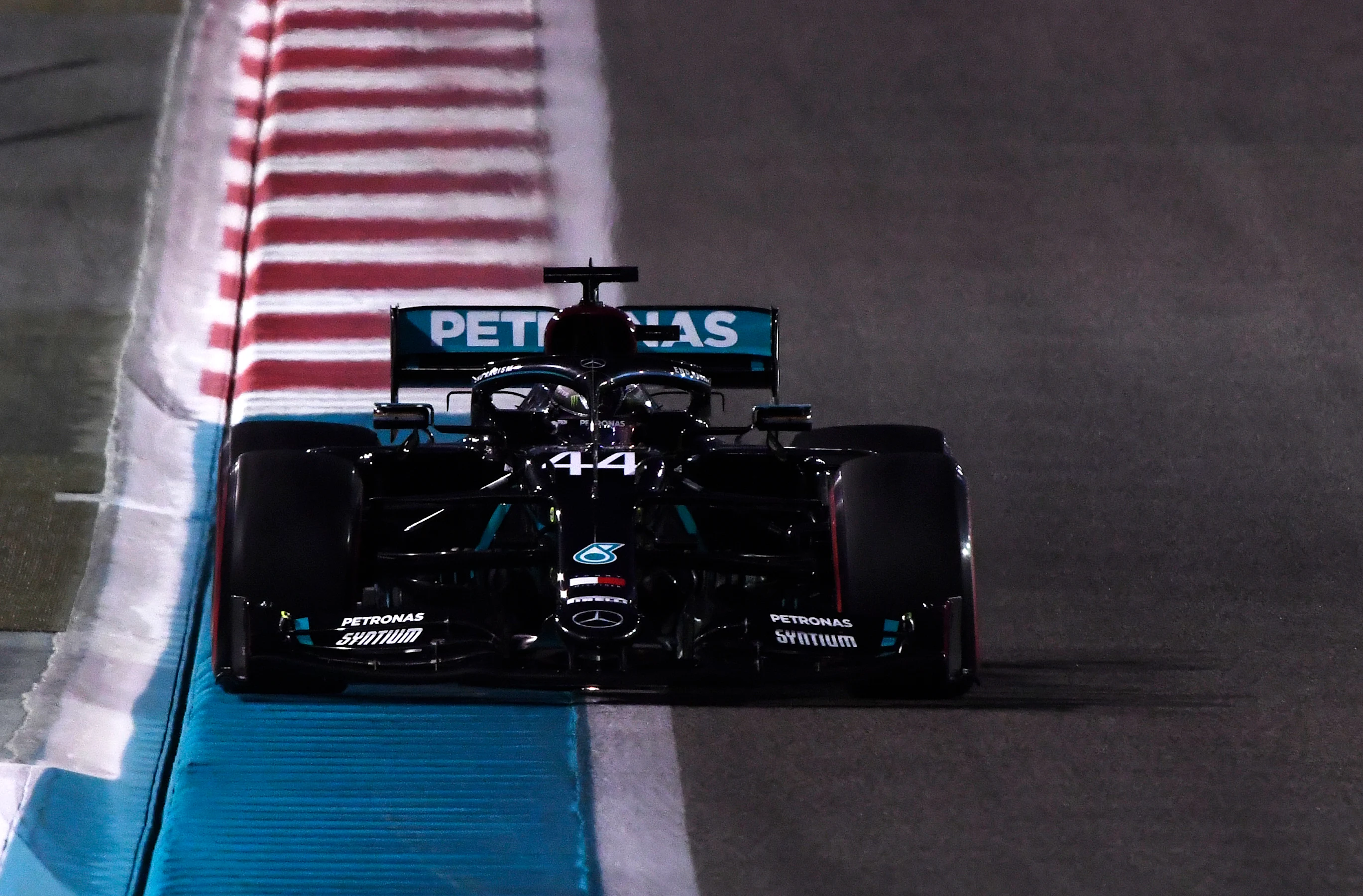 ABU DHABI, UNITED ARAB EMIRATES - DECEMBER 11: Lewis Hamilton of Great Britain driving the (44)