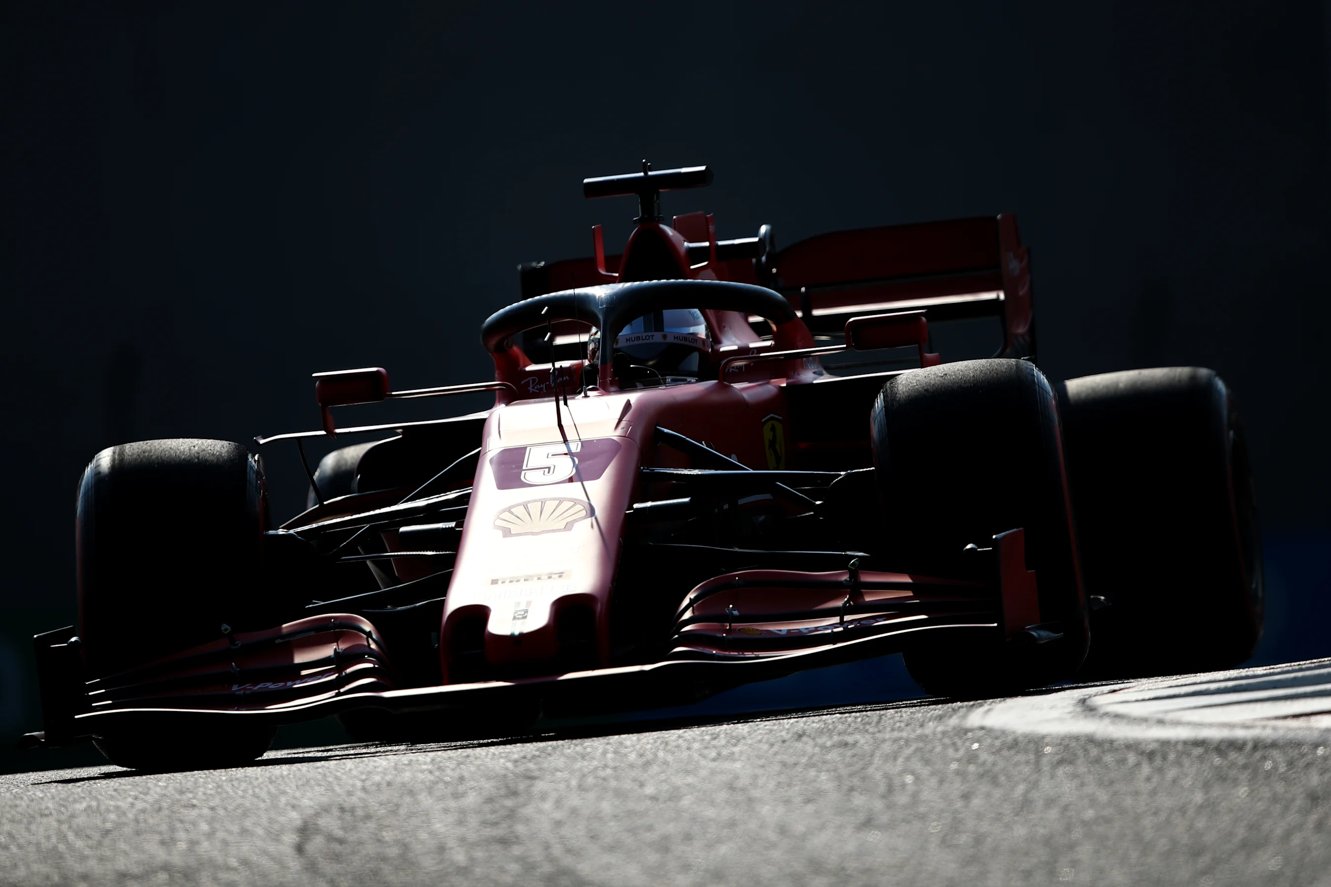 ABU DHABI, UNITED ARAB EMIRATES - DECEMBER 12: Sebastian Vettel of Germany driving the (5) Scuderia