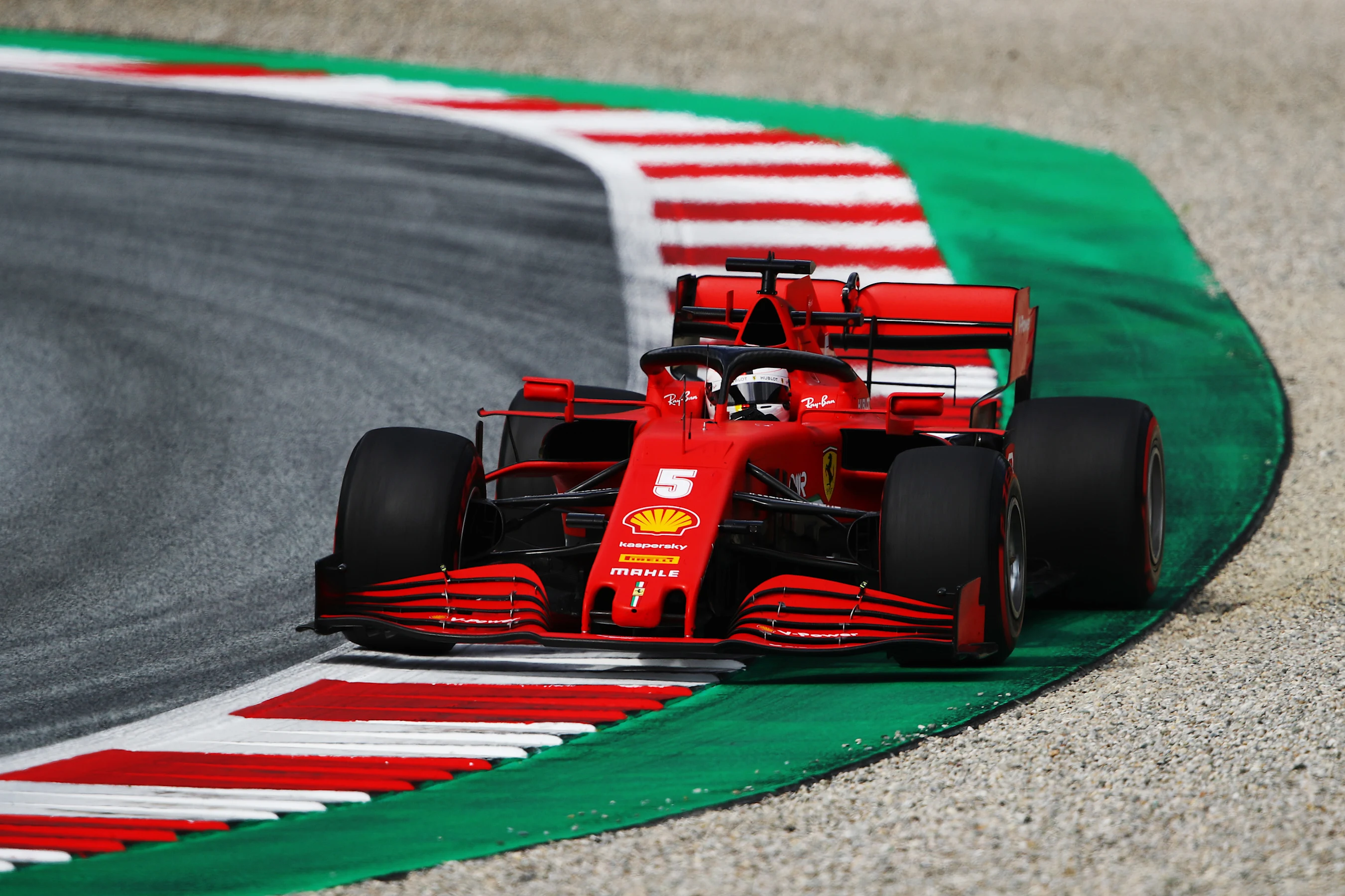 SPIELBERG, AUSTRIA - JULY 03: Sebastian Vettel of Germany driving the (5) Scuderia Ferrari SF1000