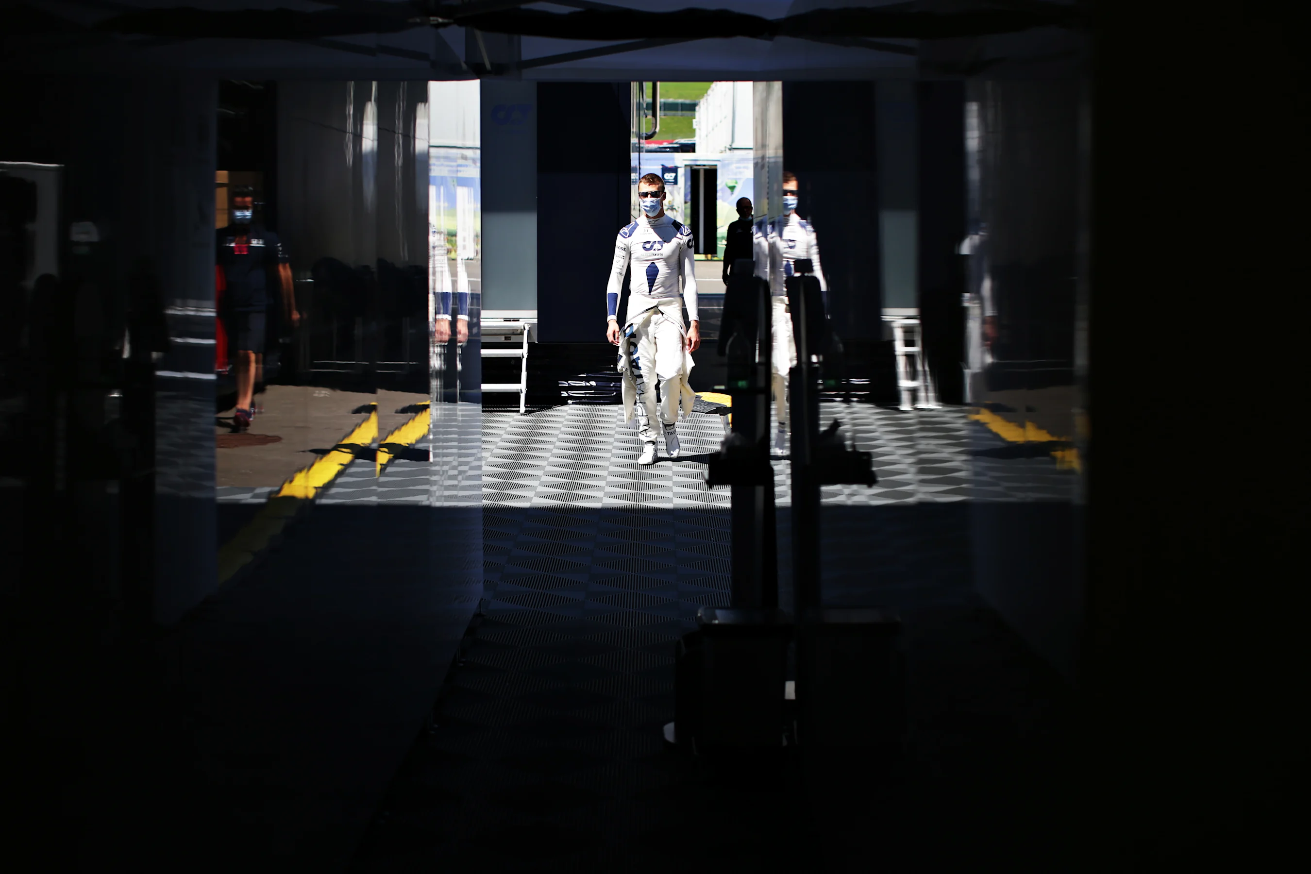 SPIELBERG, AUSTRIA - JULY 05: Daniil Kvyat of Russia and Scuderia AlphaTauri walks to the garage