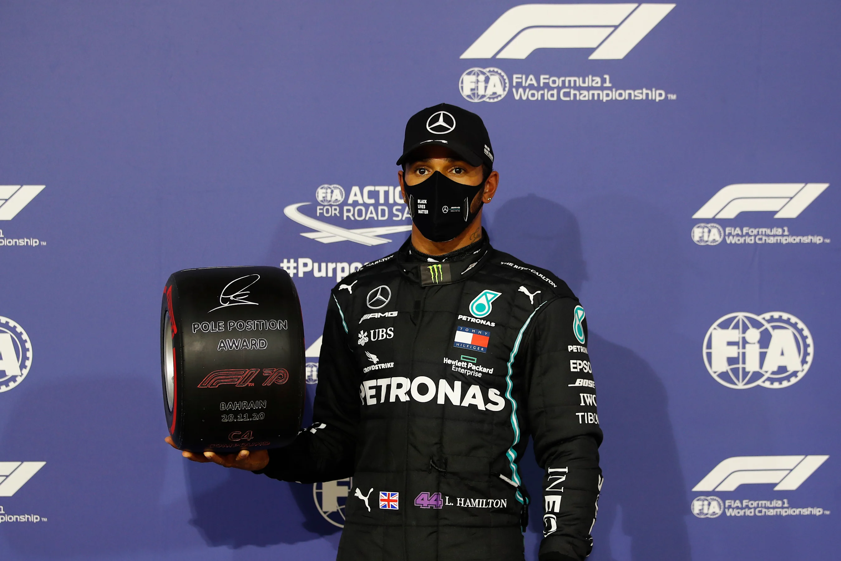 BAHRAIN, BAHRAIN - NOVEMBER 28: Pole position qualifier Lewis Hamilton of Great Britain and