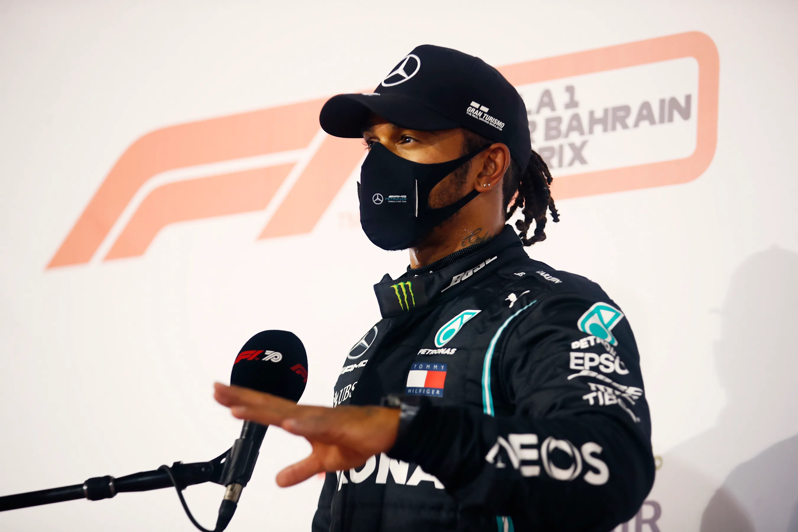 BAHRAIN, BAHRAIN - NOVEMBER 28: Pole position qualifier Lewis Hamilton of Great Britain and