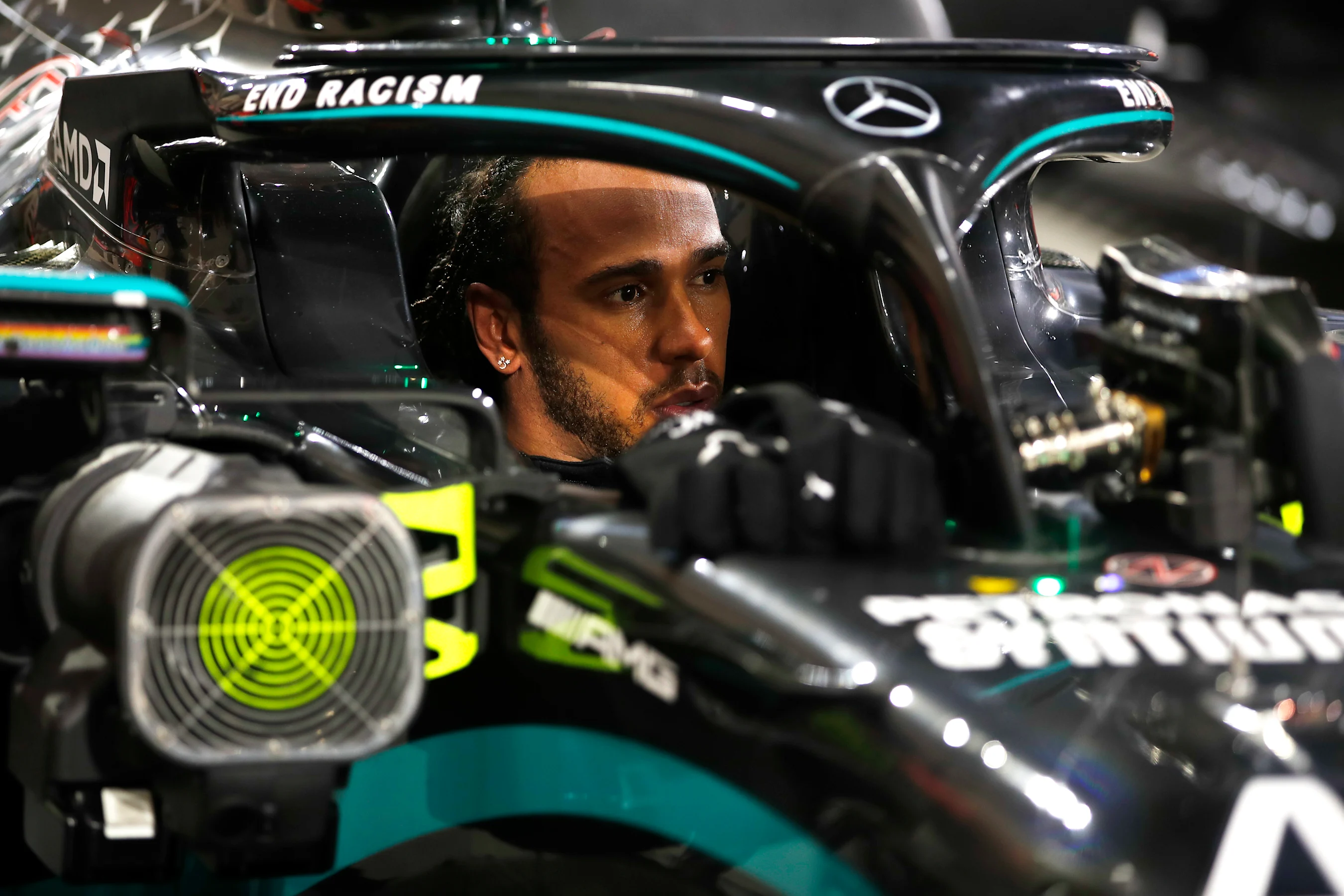 BAHRAIN, BAHRAIN - NOVEMBER 29: Race winner Lewis Hamilton of Great Britain and Mercedes GP