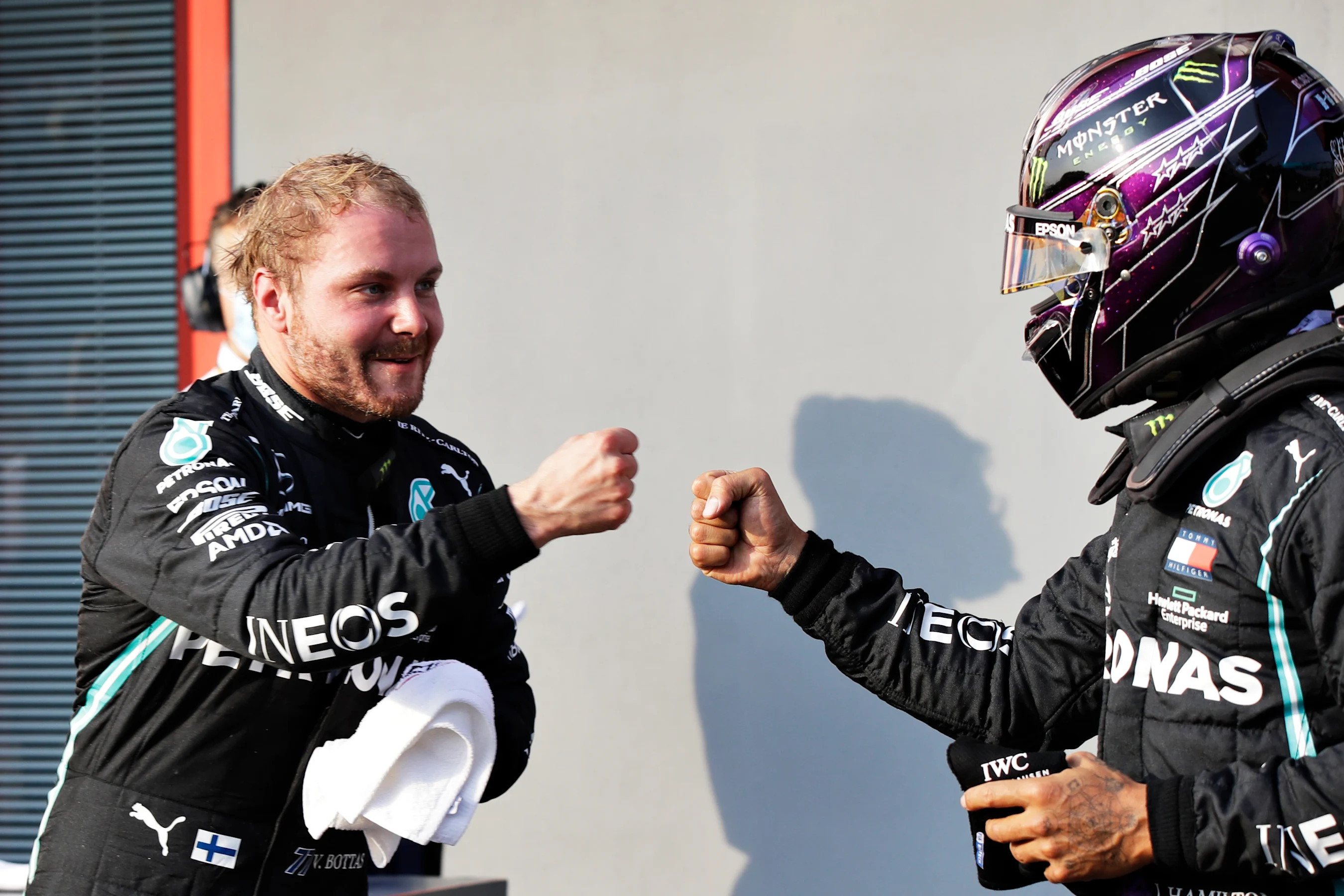 IMOLA, ITALY - OCTOBER 31: Pole position qualifier Valtteri Bottas of Finland and Mercedes GP bumps