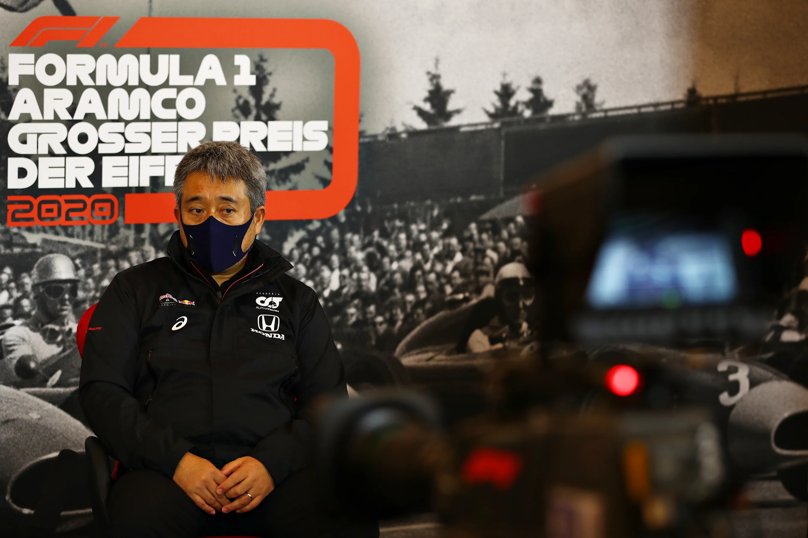 NUERBURG, GERMANY - OCTOBER 09: Masashi Yamamoto of Honda talks in the Team Principals Press