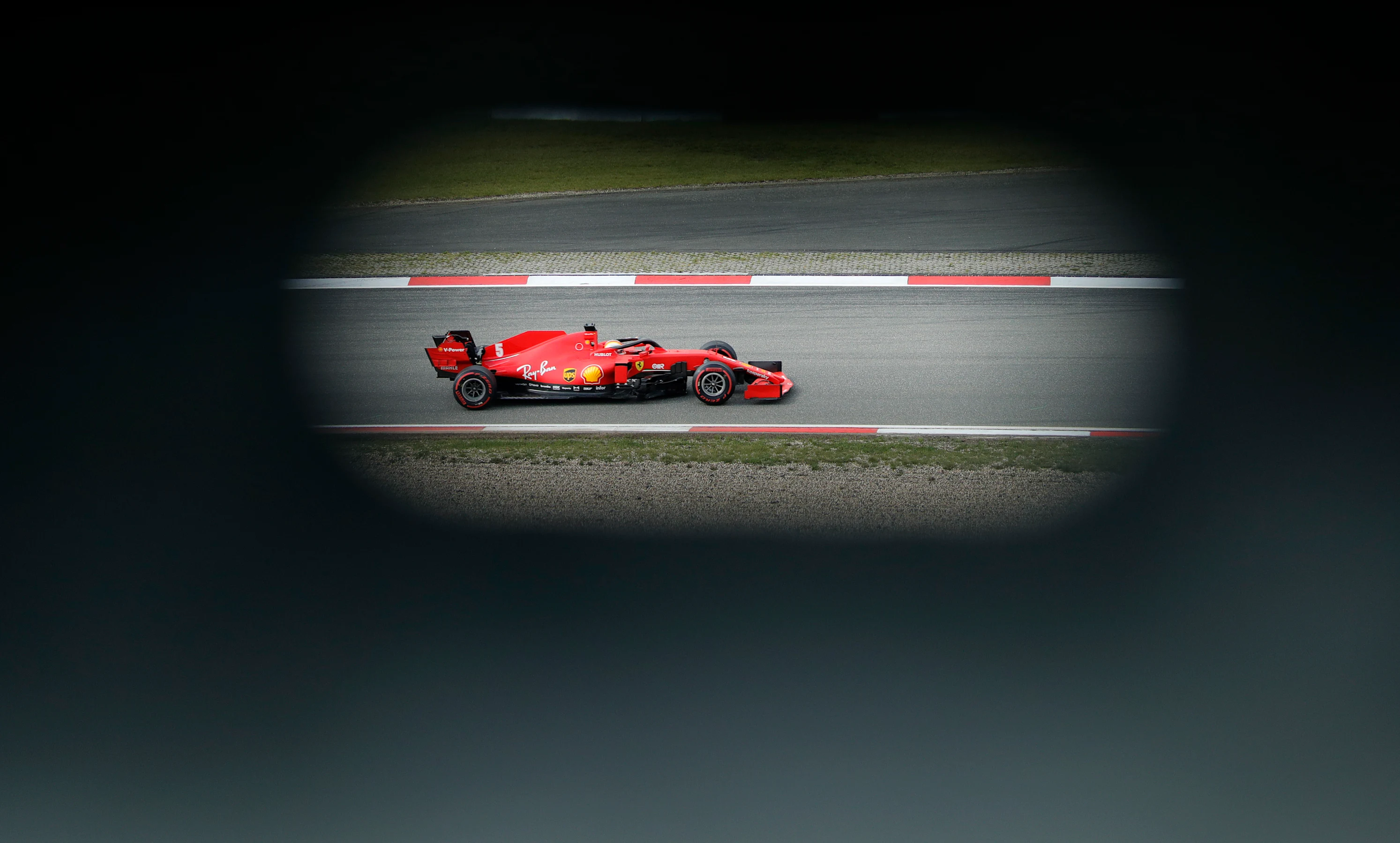 NUERBURG, GERMANY - OCTOBER 10: Sebastian Vettel of Germany driving the (5) Scuderia Ferrari SF1000