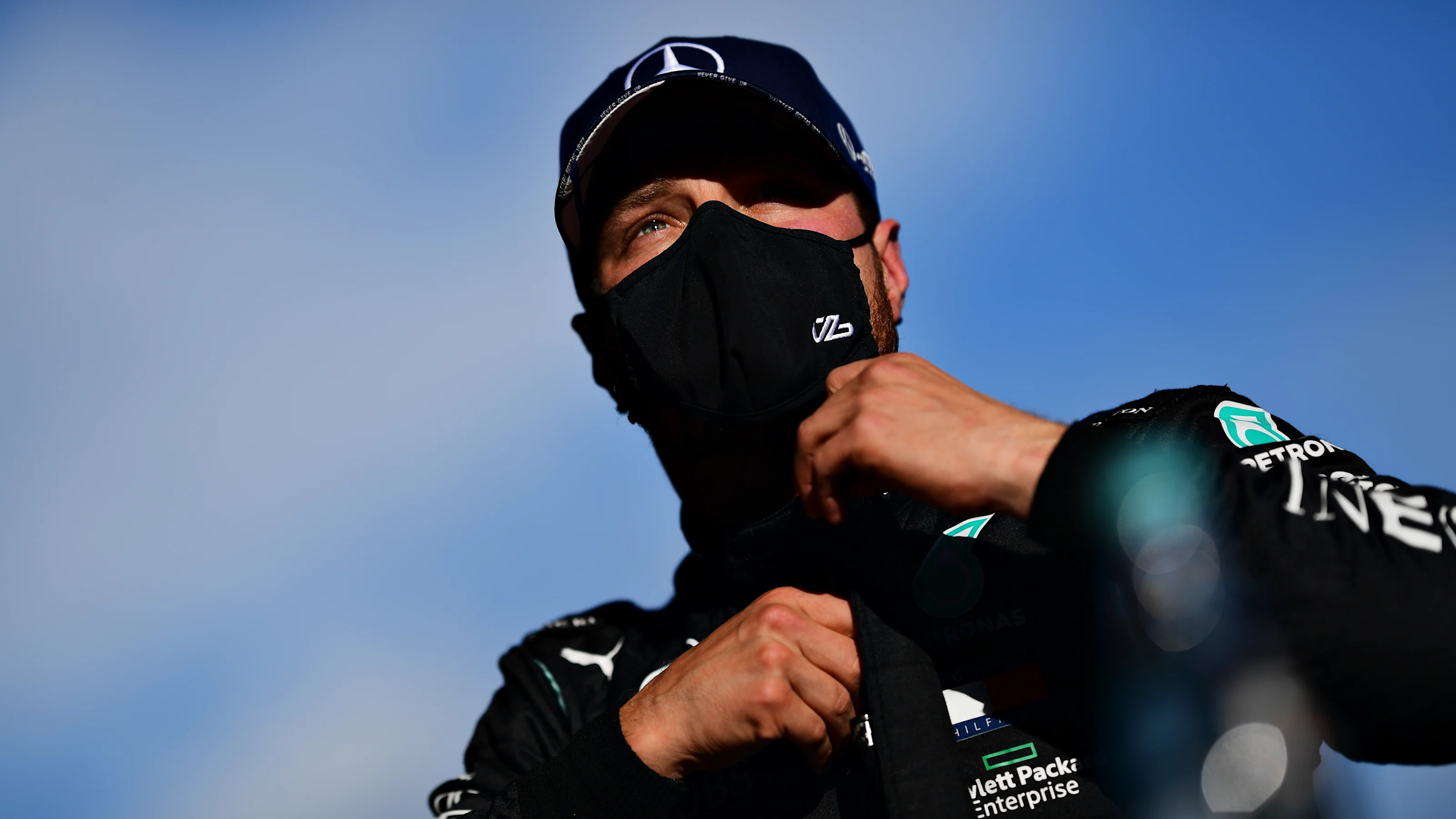 NUERBURG, GERMANY - OCTOBER 10: Pole position qualifier Valtteri Bottas of Finland and Mercedes GP