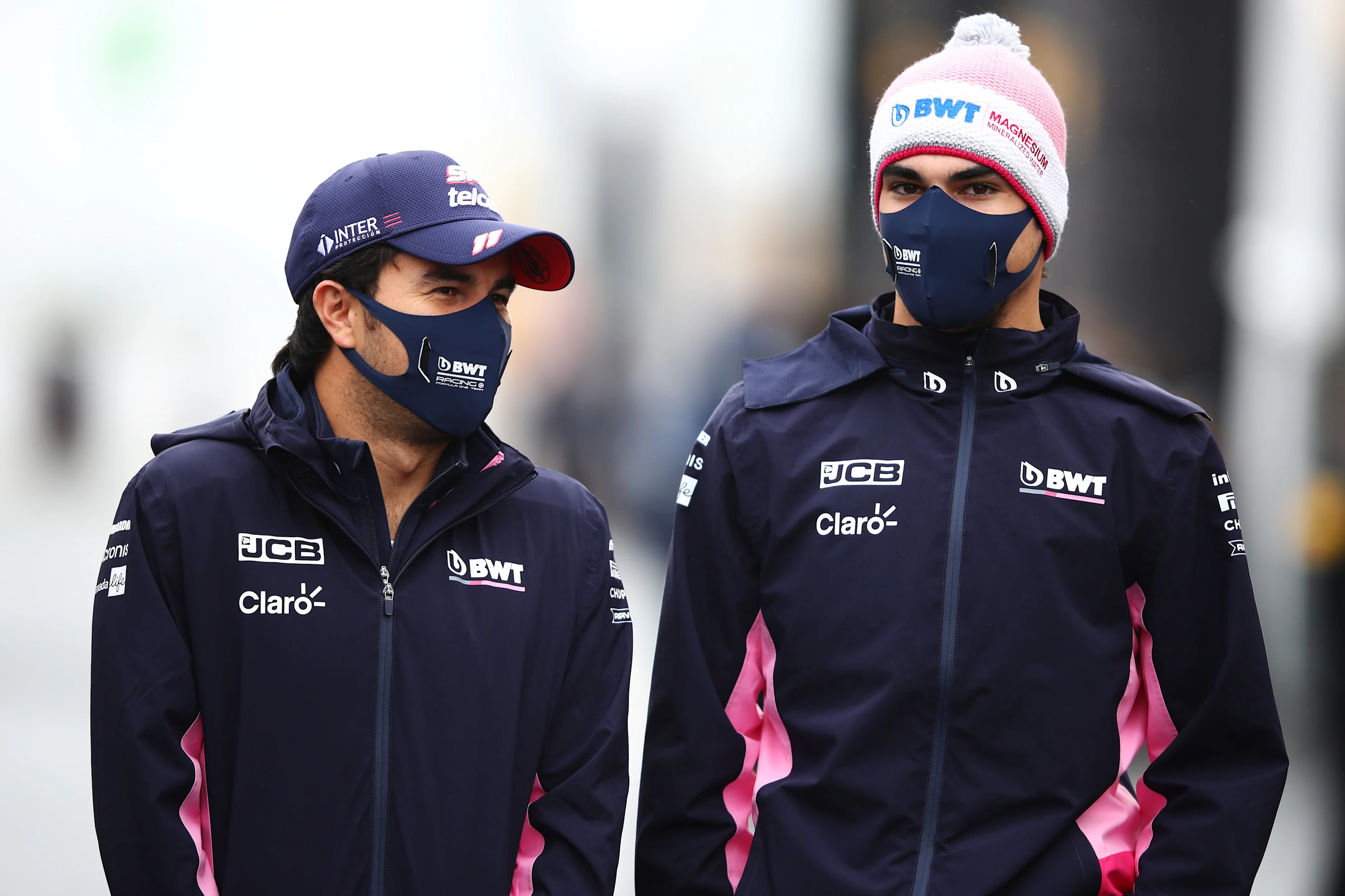 NUERBURG, GERMANY - OCTOBER 08: Sergio Perez of Mexico and Racing Point and Nicholas Latifi of