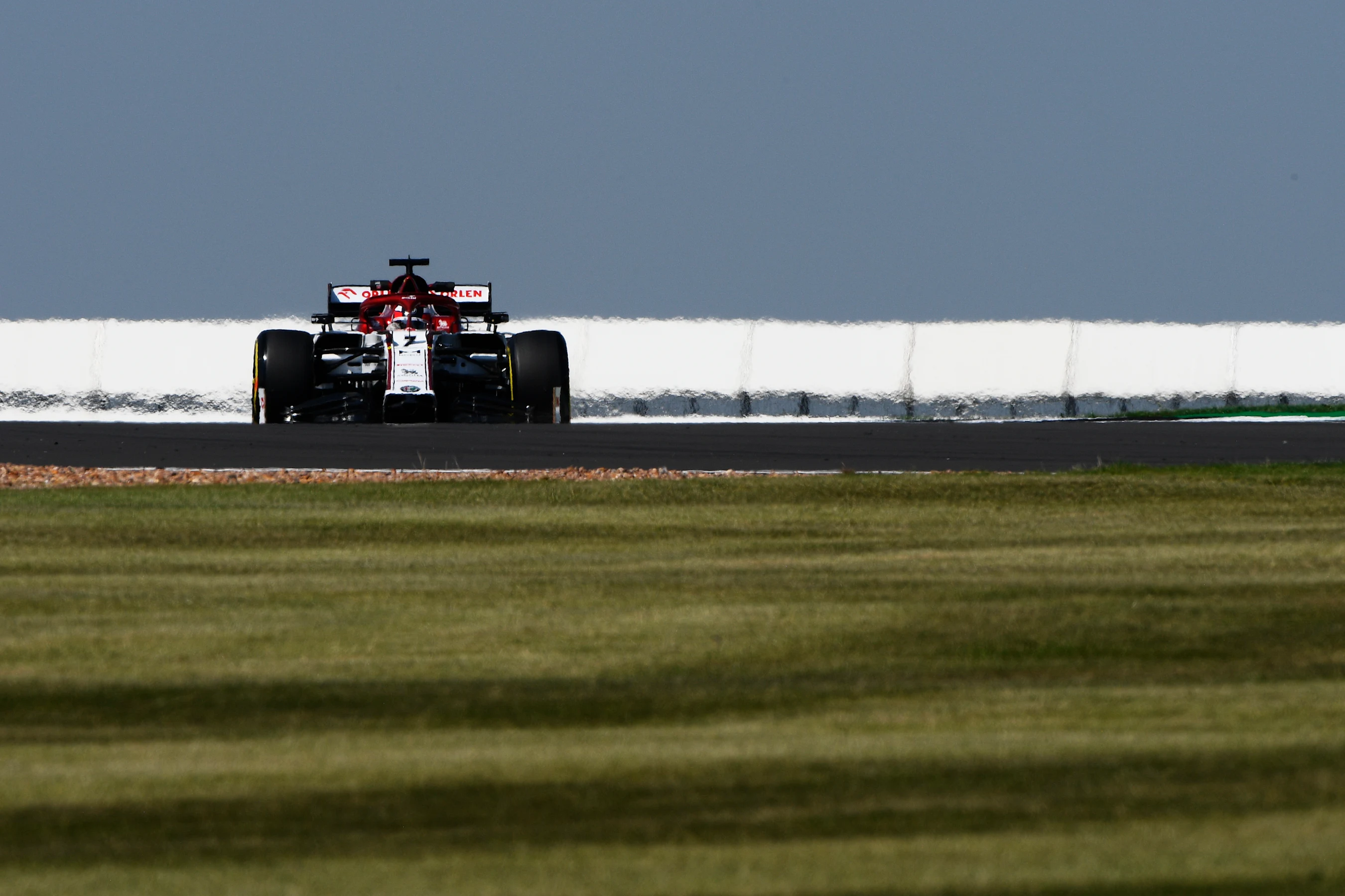 NORTHAMPTON, ENGLAND - JULY 31: Kimi Raikkonen of Finland driving the (7) Alfa Romeo Racing C39