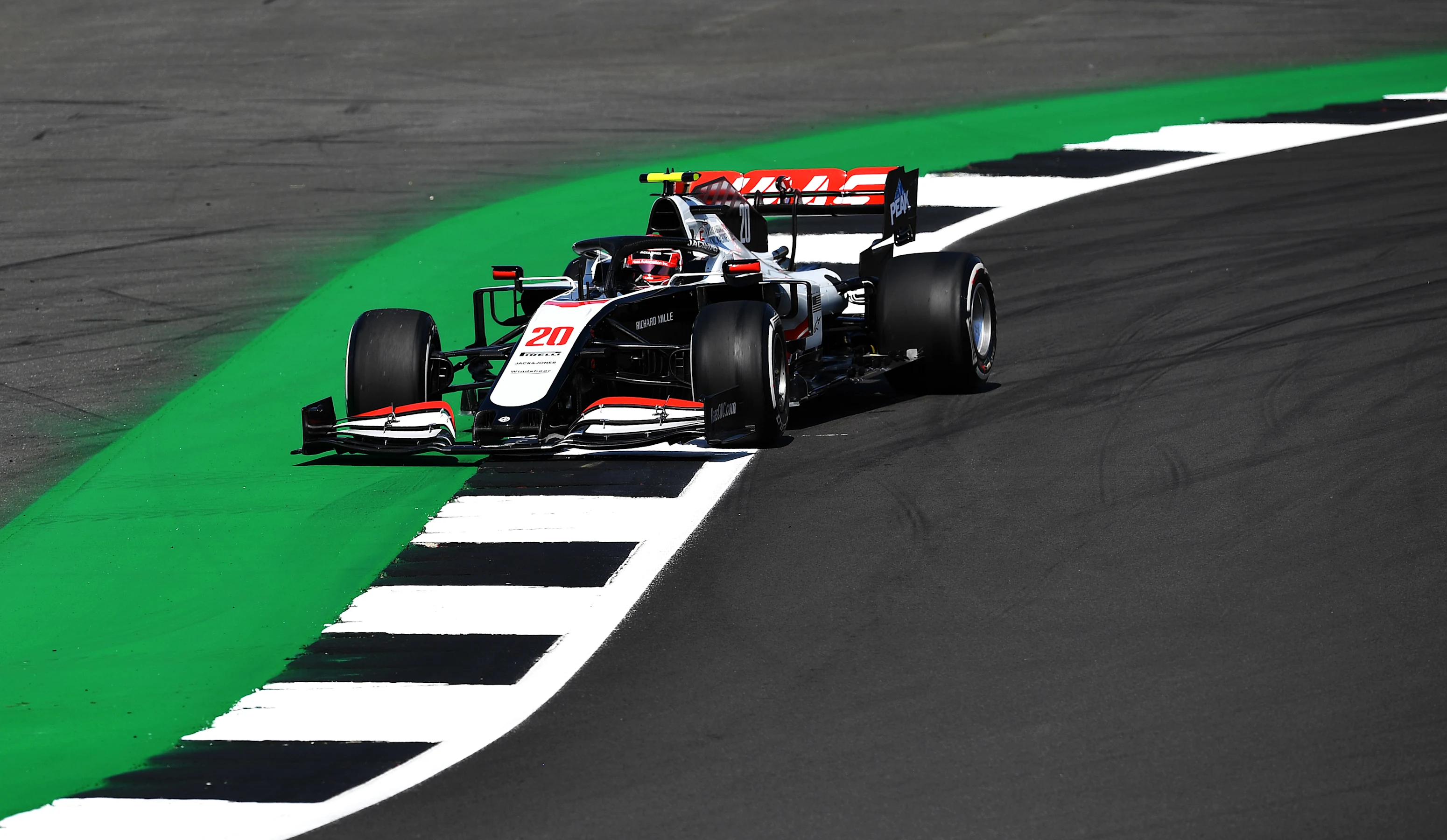 NORTHAMPTON, ENGLAND - JULY 31: Kevin Magnussen of Denmark driving the (20) Haas F1 Team VF-20