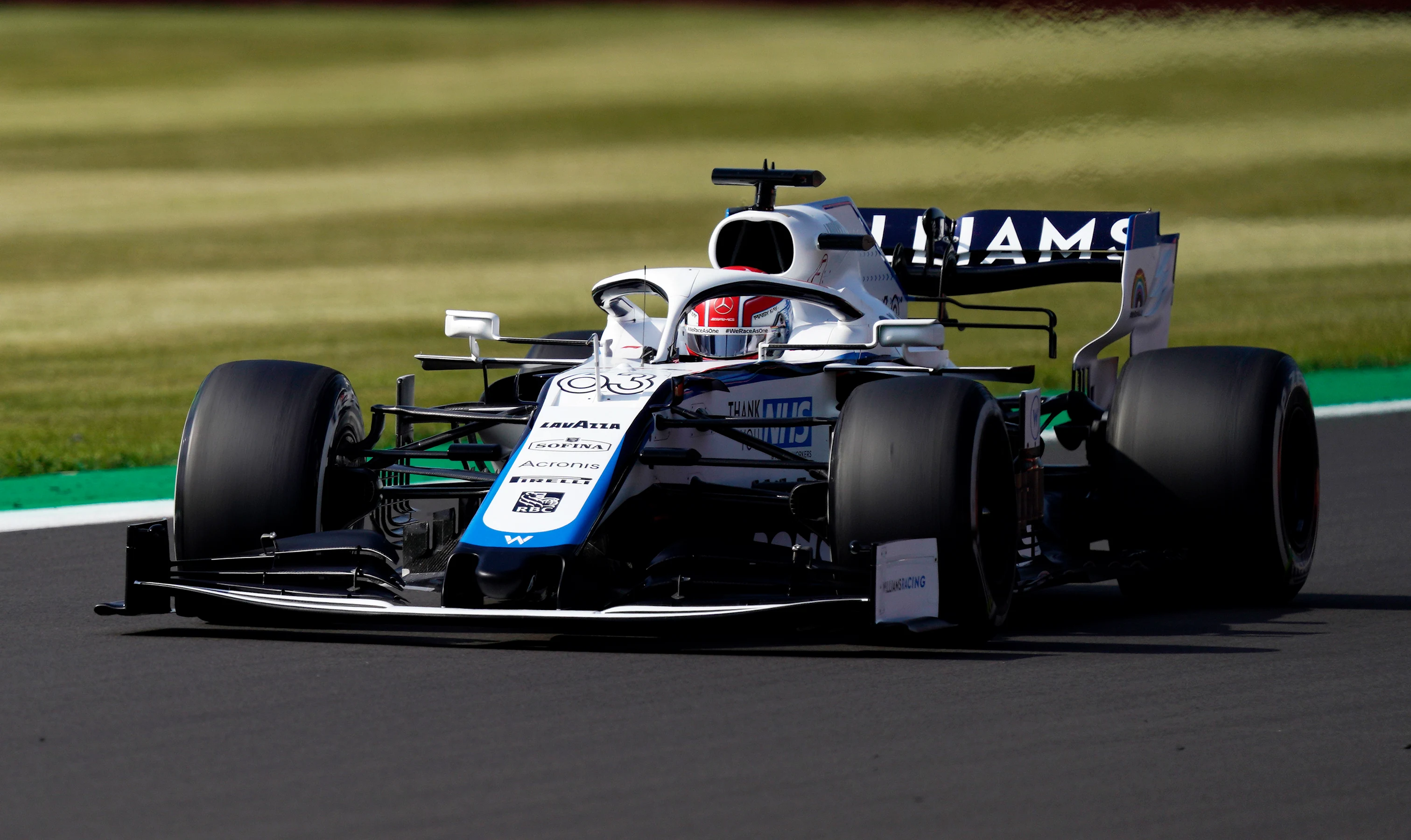 NORTHAMPTON, ENGLAND - JULY 31: George Russell of Great Britain driving the (63) Williams Racing