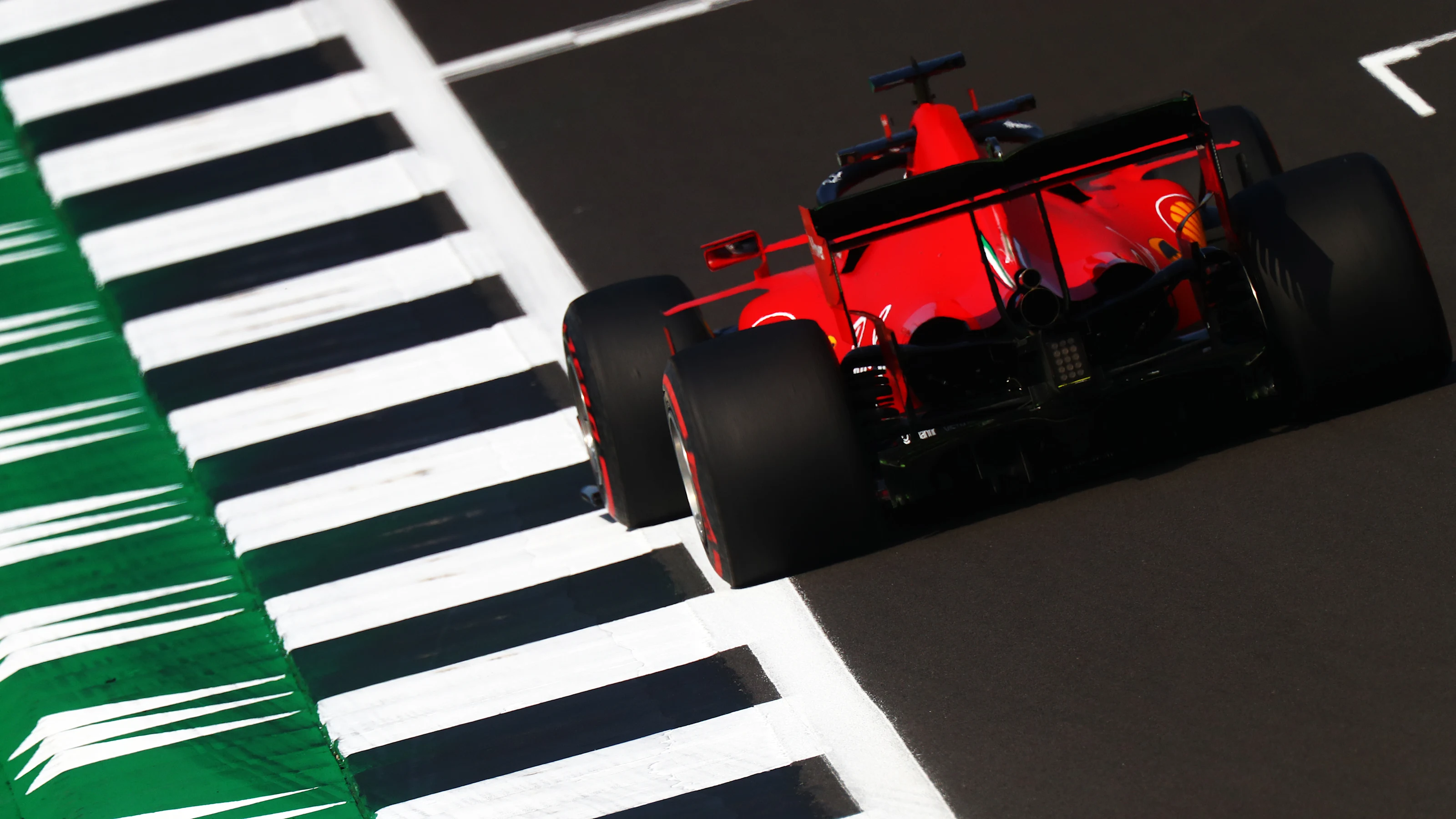 NORTHAMPTON, ENGLAND - JULY 31: Sebastian Vettel of Germany driving the (5) Scuderia Ferrari SF1000