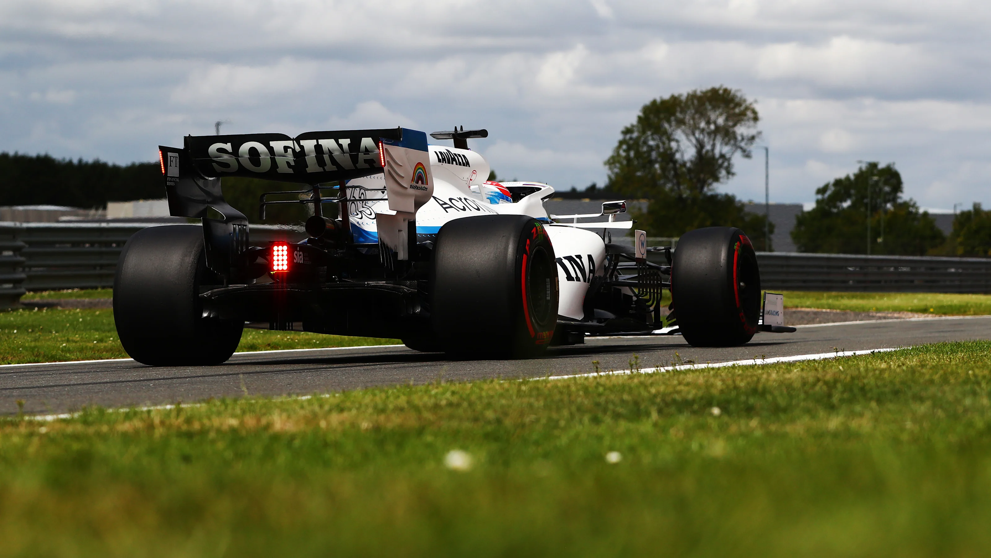 NORTHAMPTON, ENGLAND - AUGUST 01: George Russell of Great Britain driving the (63) Williams Racing
