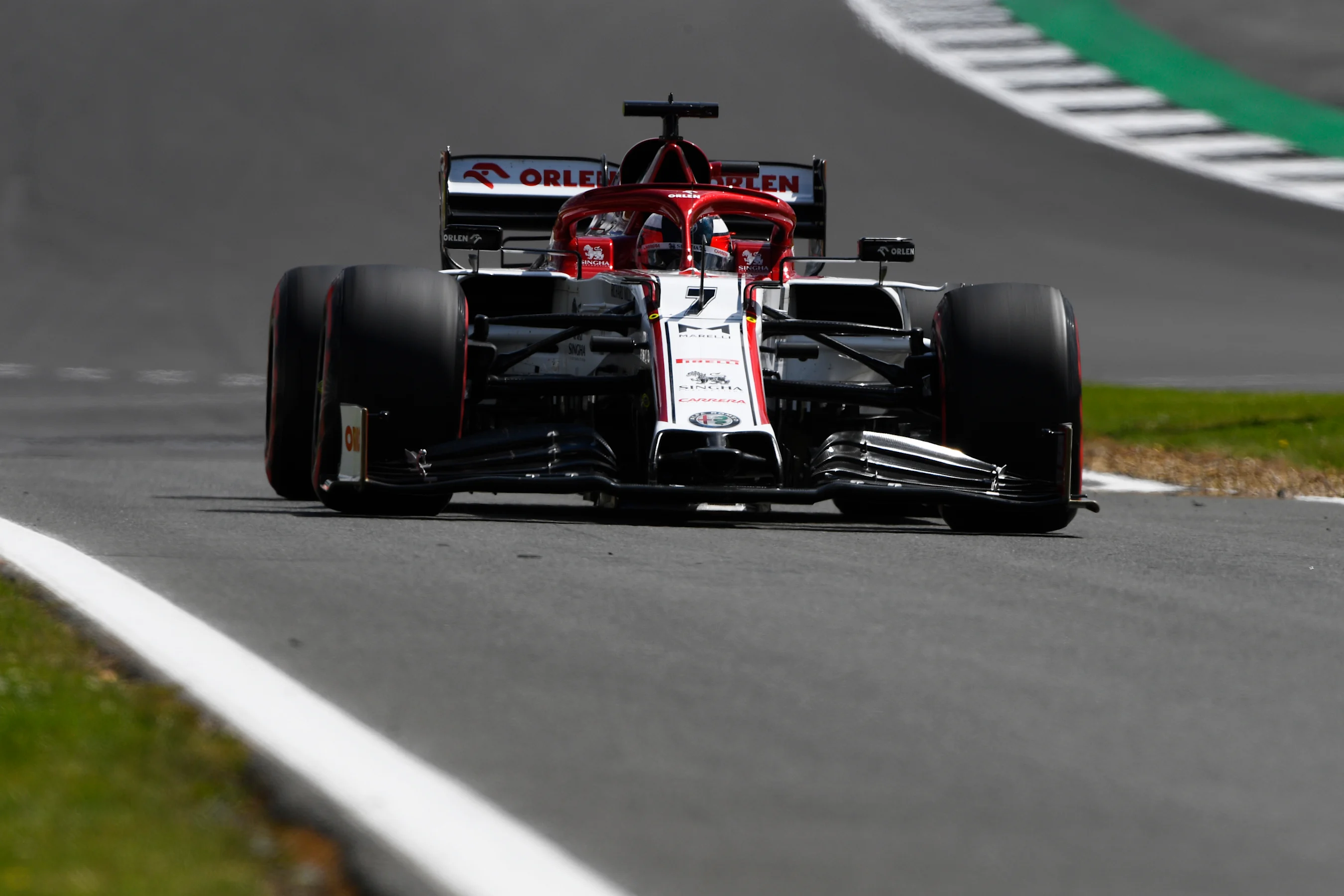 NORTHAMPTON, ENGLAND - AUGUST 01: Kimi Raikkonen of Finland driving the (7) Alfa Romeo Racing C39