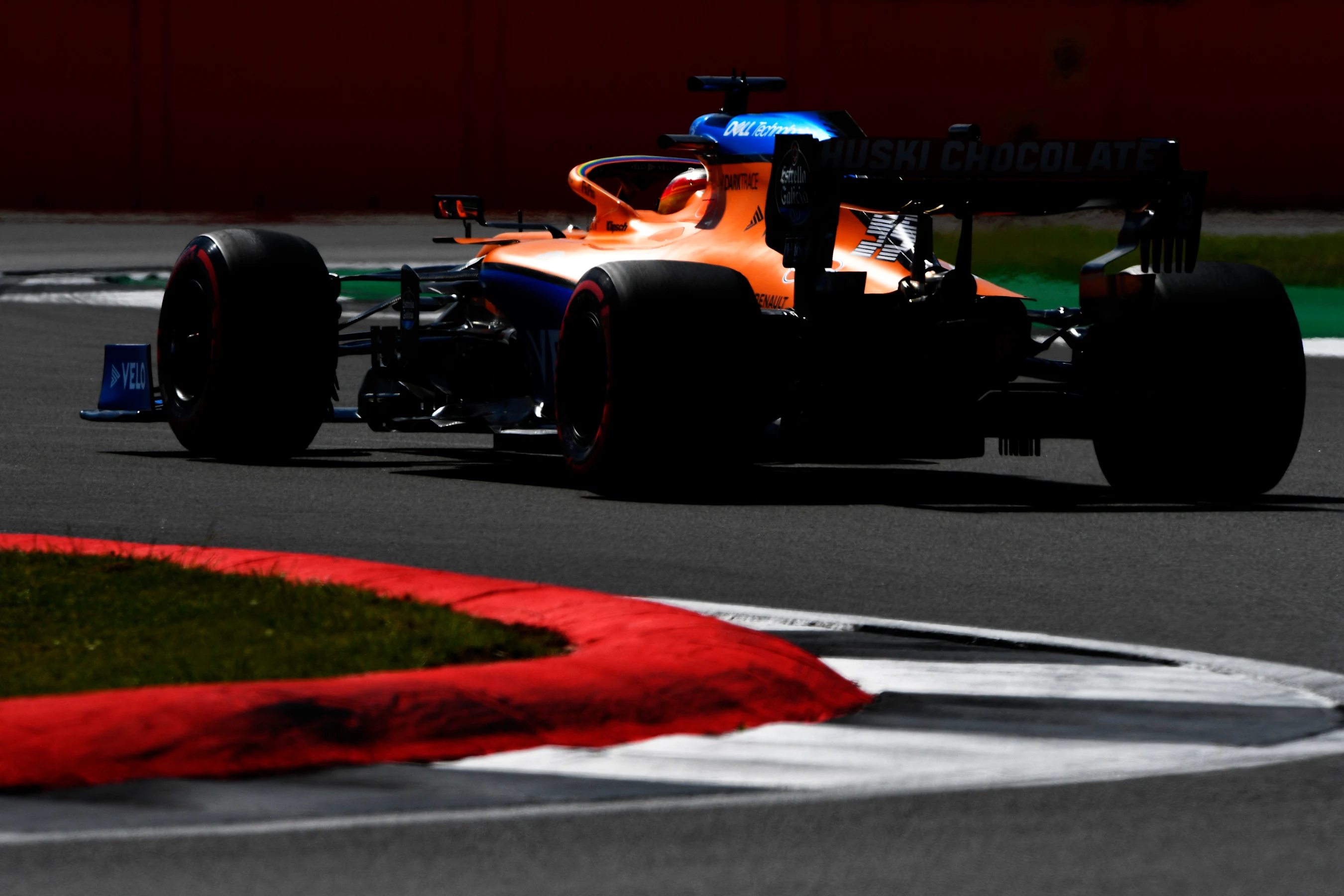 NORTHAMPTON, ENGLAND - AUGUST 01: Carlos Sainz of Spain driving the (55) McLaren F1 Team MCL35