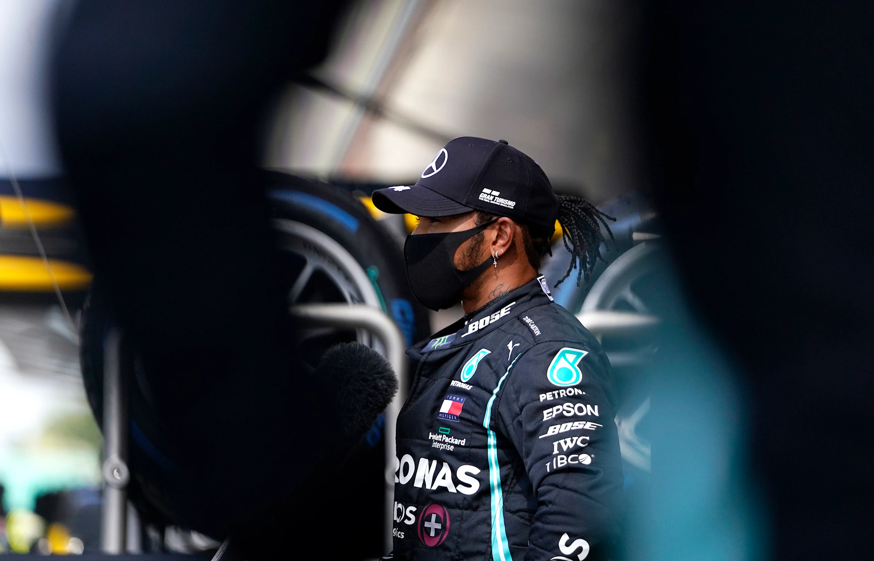NORTHAMPTON, ENGLAND - AUGUST 01: Pole position qualifier Lewis Hamilton of Great Britain and
