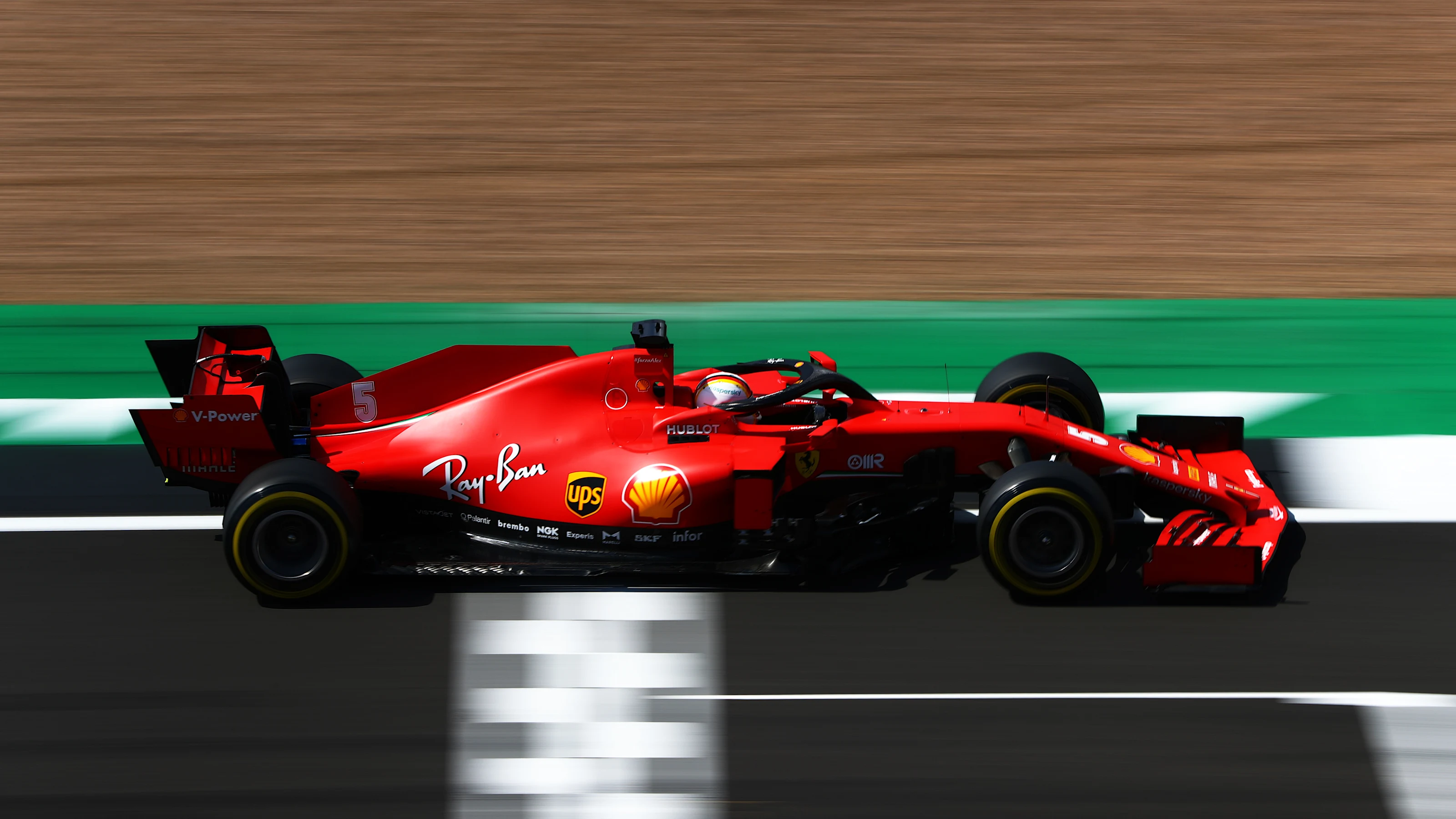 NORTHAMPTON, ENGLAND - AUGUST 01: Sebastian Vettel of Germany driving the (5) Scuderia Ferrari
