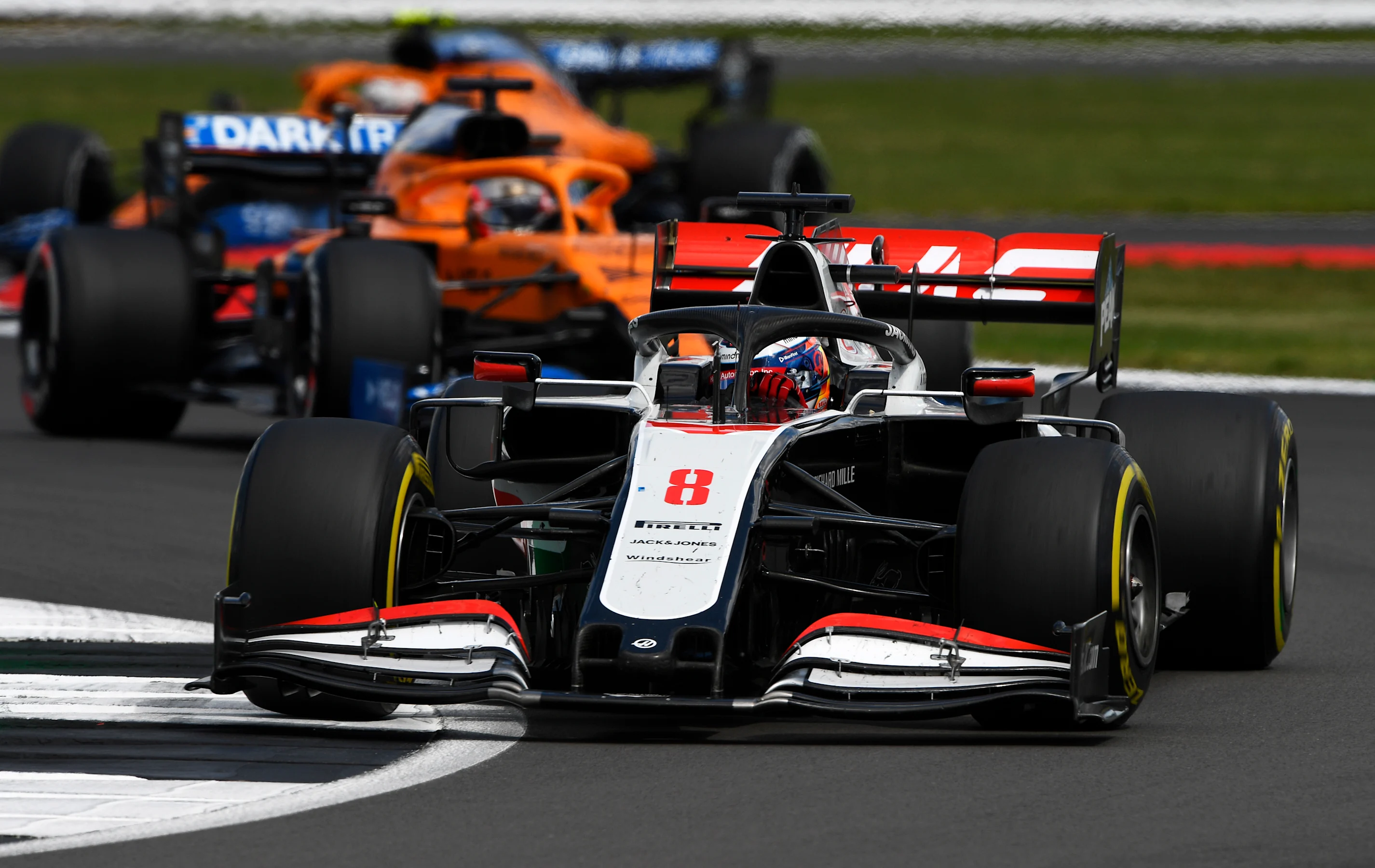 NORTHAMPTON, ENGLAND - AUGUST 02: Romain Grosjean of France driving the (8) Haas F1 Team VF-20