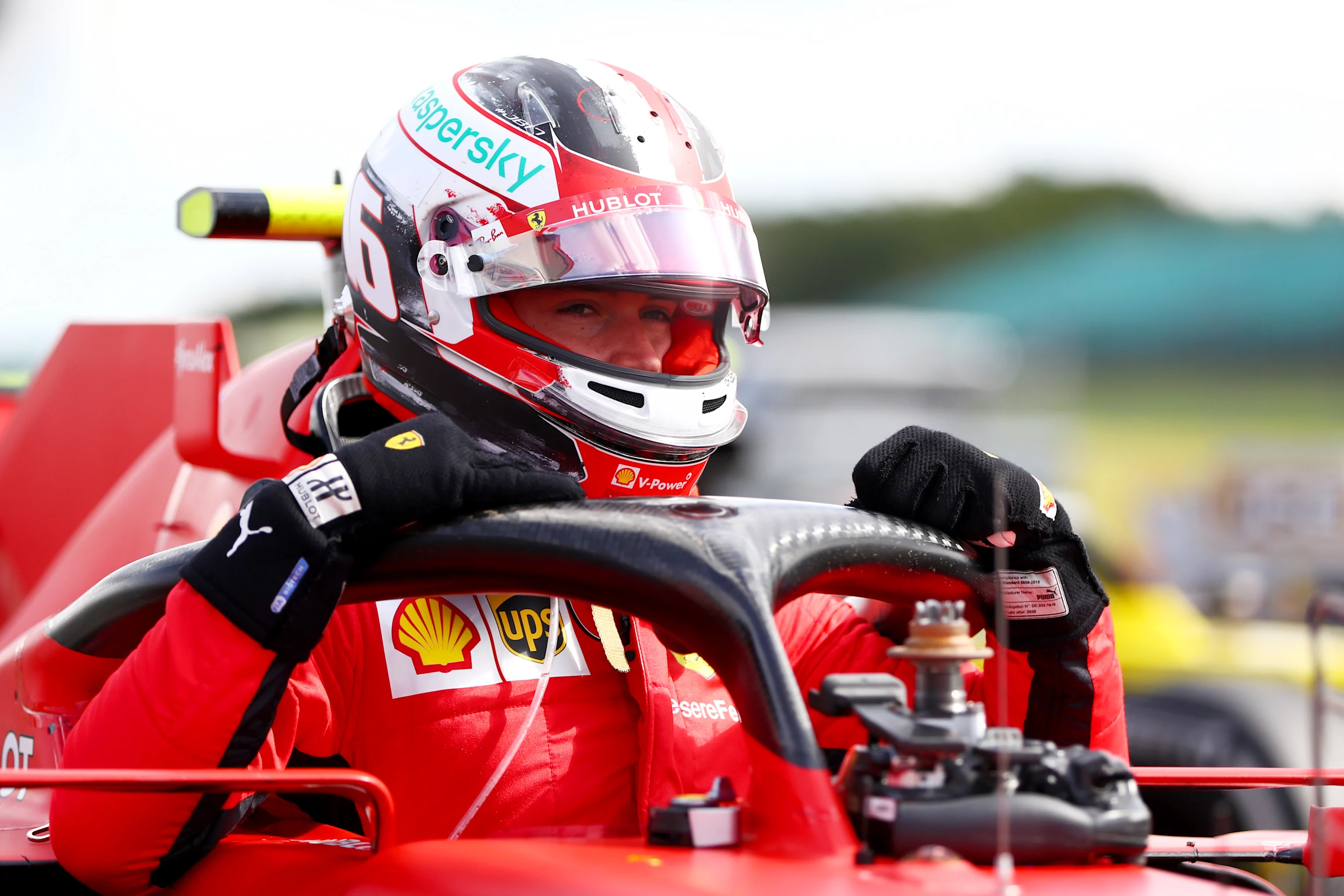 NORTHAMPTON, ENGLAND - AUGUST 02: Charles Leclerc of Monaco and Ferrari climbs out of his car in