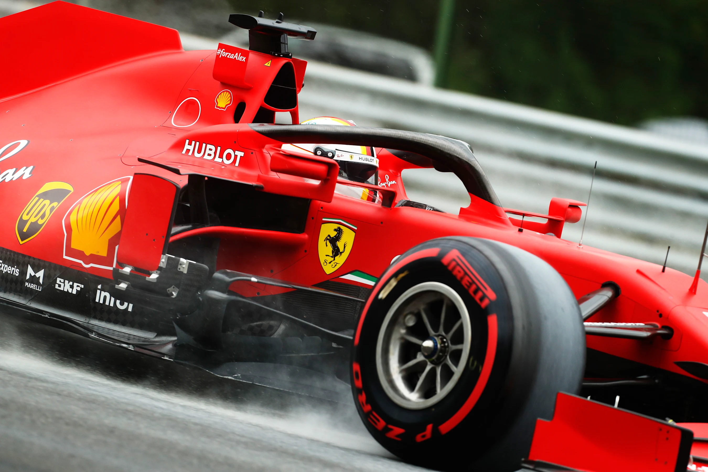 BUDAPEST, HUNGARY - JULY 18: Sebastian Vettel of Germany driving the (5) Scuderia Ferrari SF1000 on