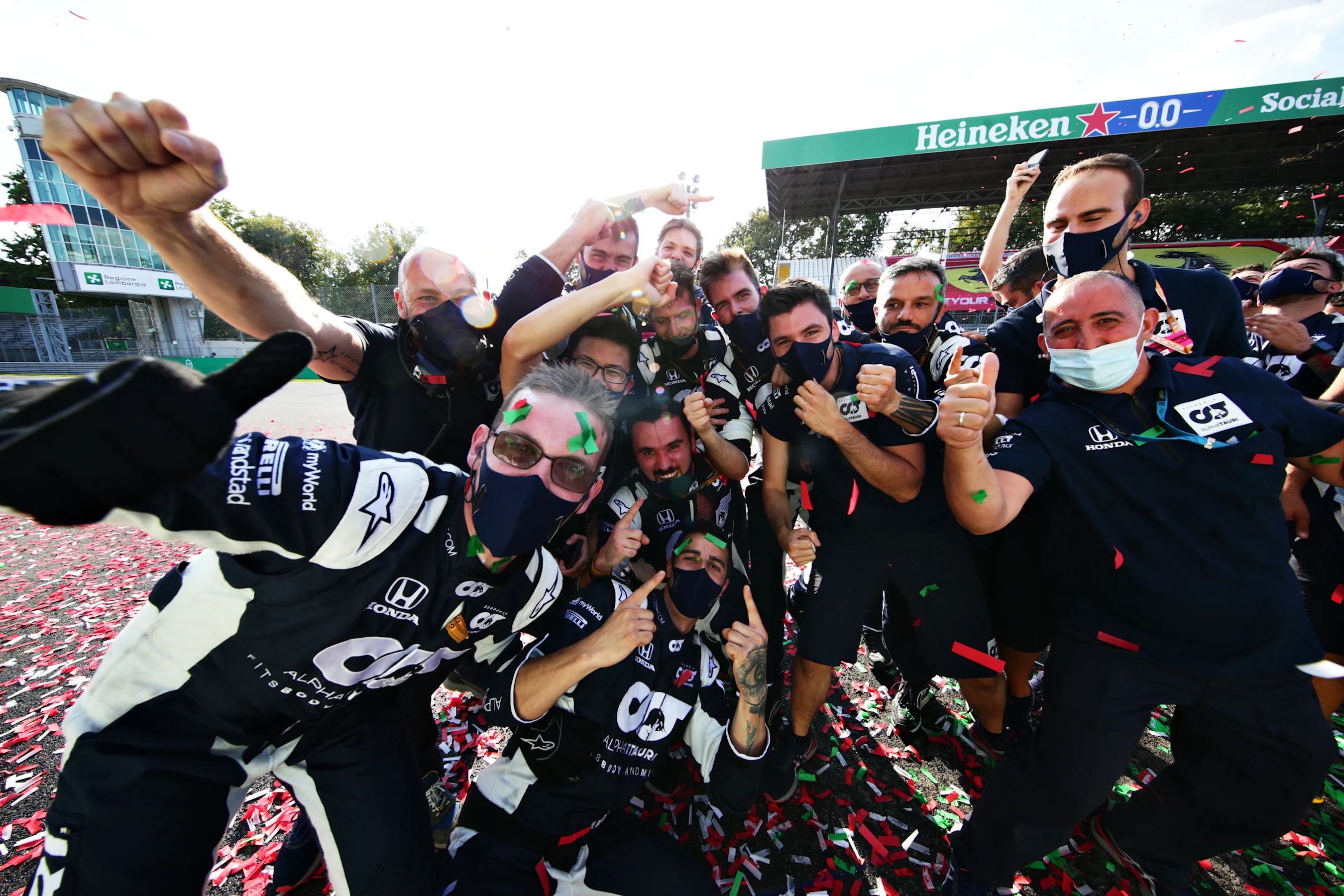 MONZA, ITALY - SEPTEMBER 06: The Scuderia AlphaTauri team celebrate the win of Pierre Gasly of