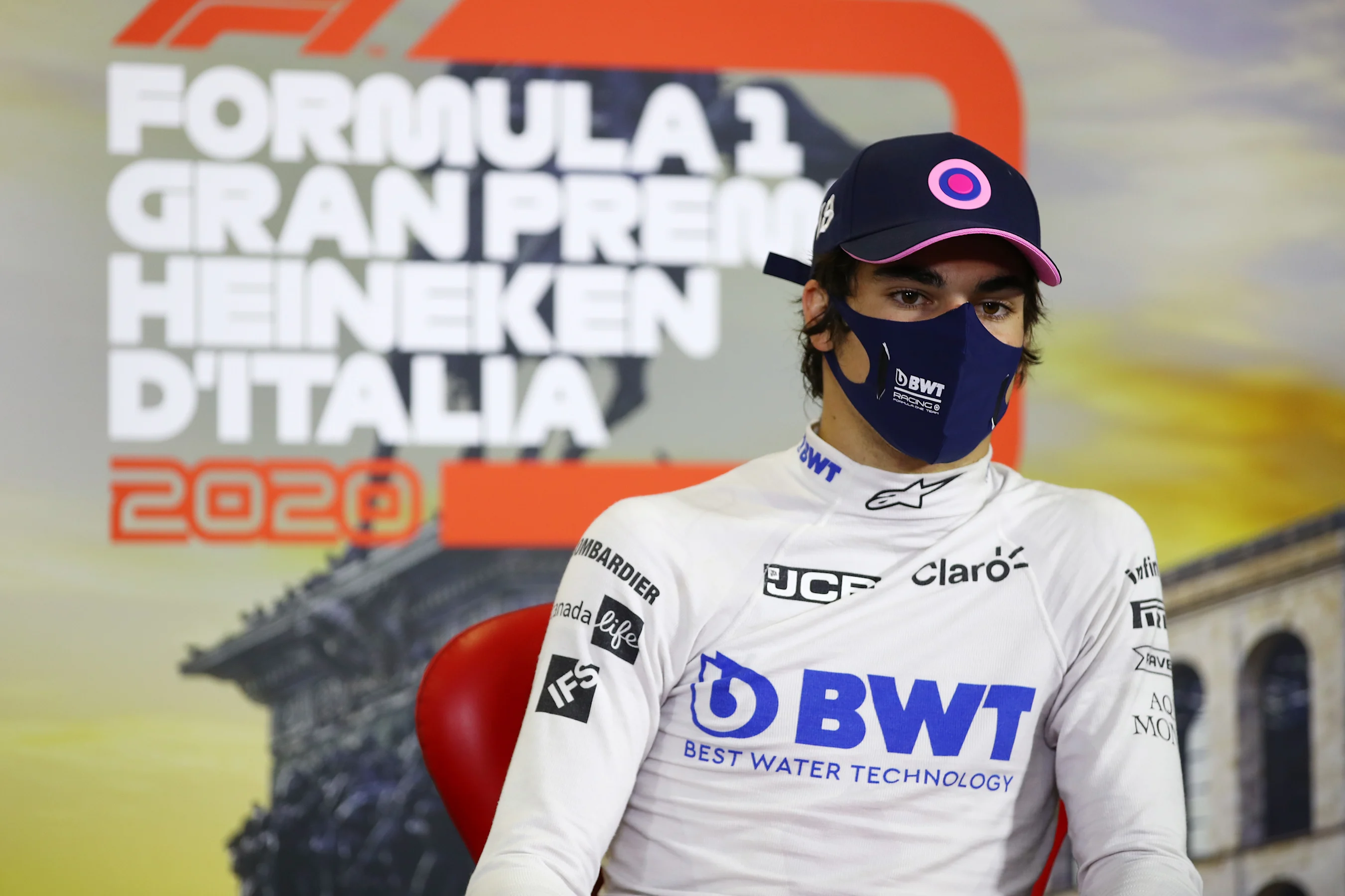 MONZA, ITALY - SEPTEMBER 06: Third placed Lance Stroll of Canada and Racing Point talks in the