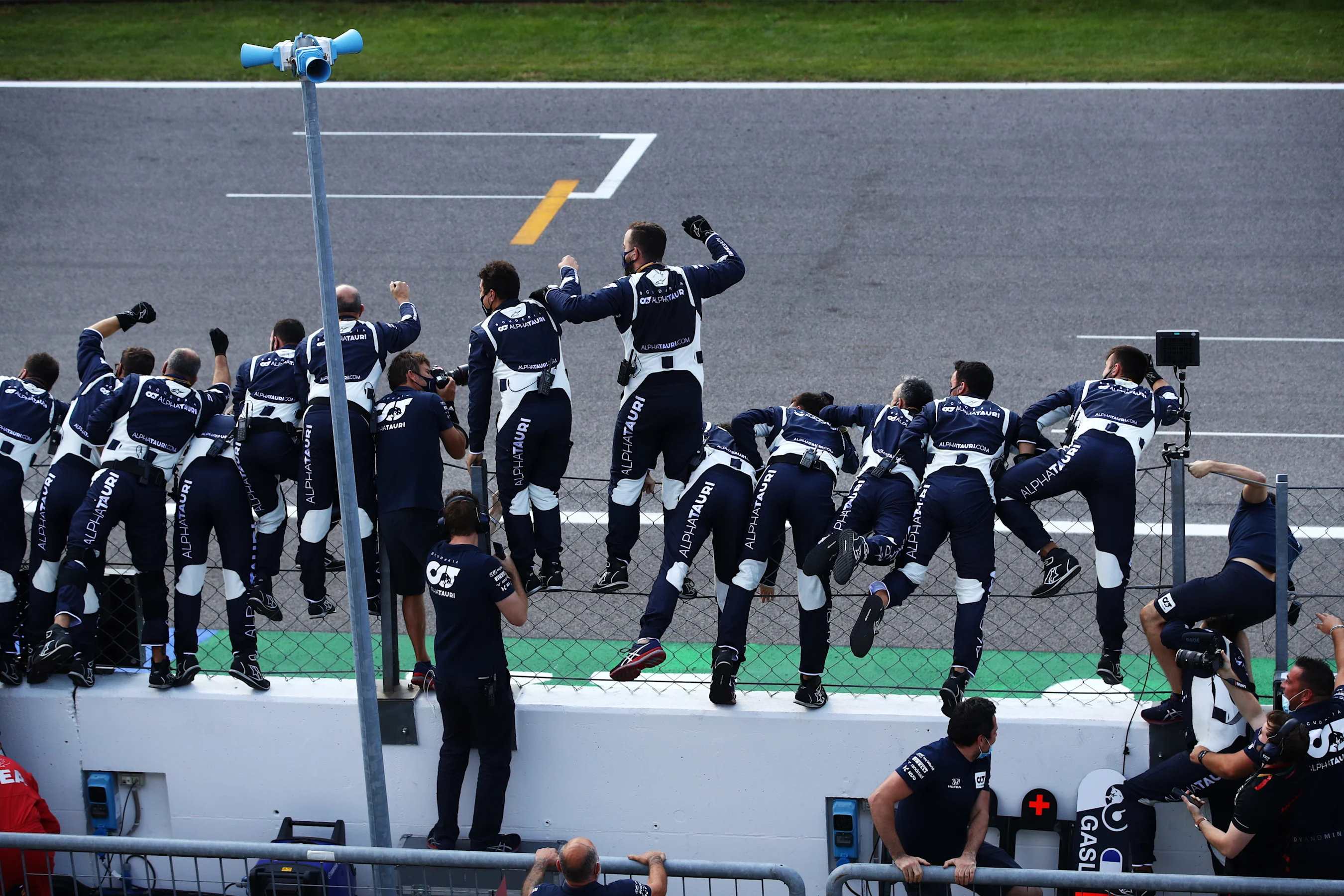 MONZA, ITALY - SEPTEMBER 06: Scuderia AlphaTauri team members celebrate during the F1 Grand Prix of