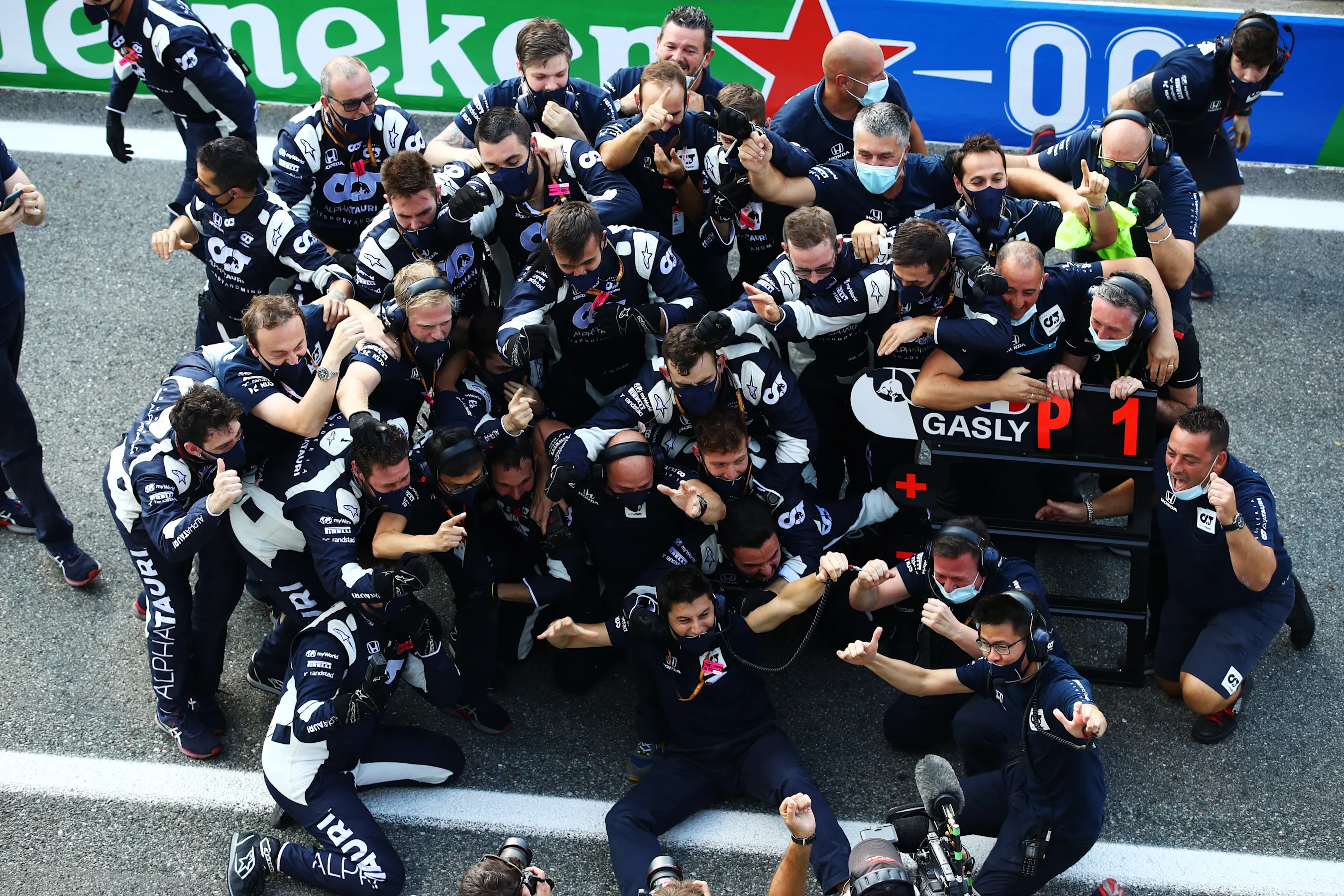 MONZA, ITALY - SEPTEMBER 06: Scuderia AlphaTauri team members celebrate during the F1 Grand Prix of