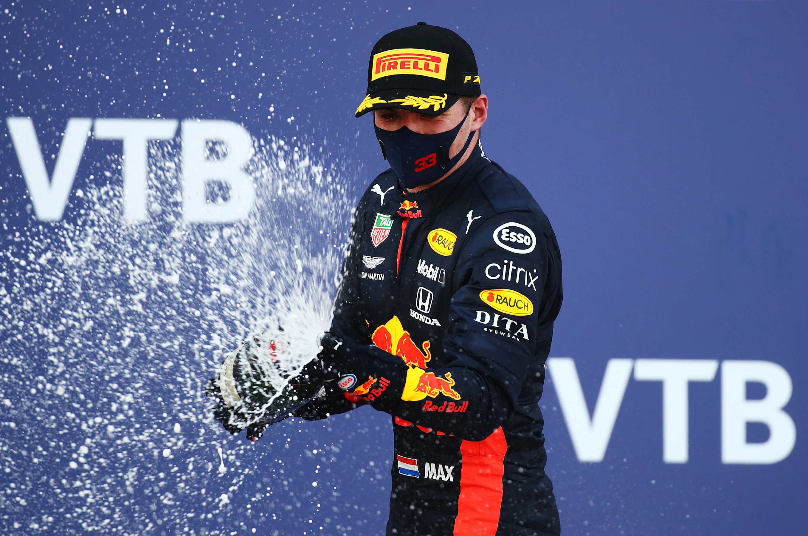 SOCHI, RUSSIA - SEPTEMBER 27: Second placed Max Verstappen of Netherlands and Red Bull Racing