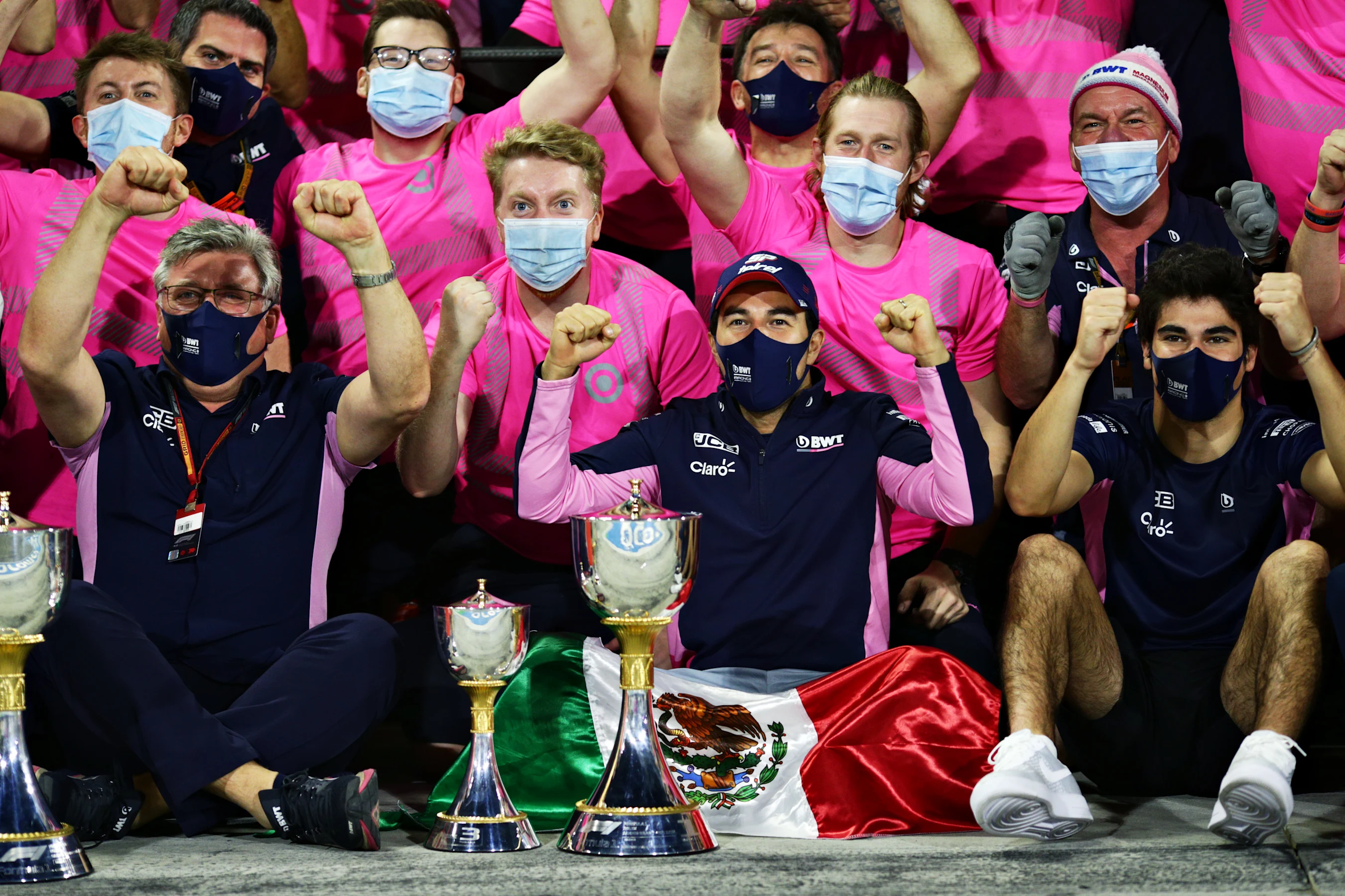 BAHRAIN, BAHRAIN - DECEMBER 06: Race winner Sergio Perez of Mexico and Racing Point, third placed