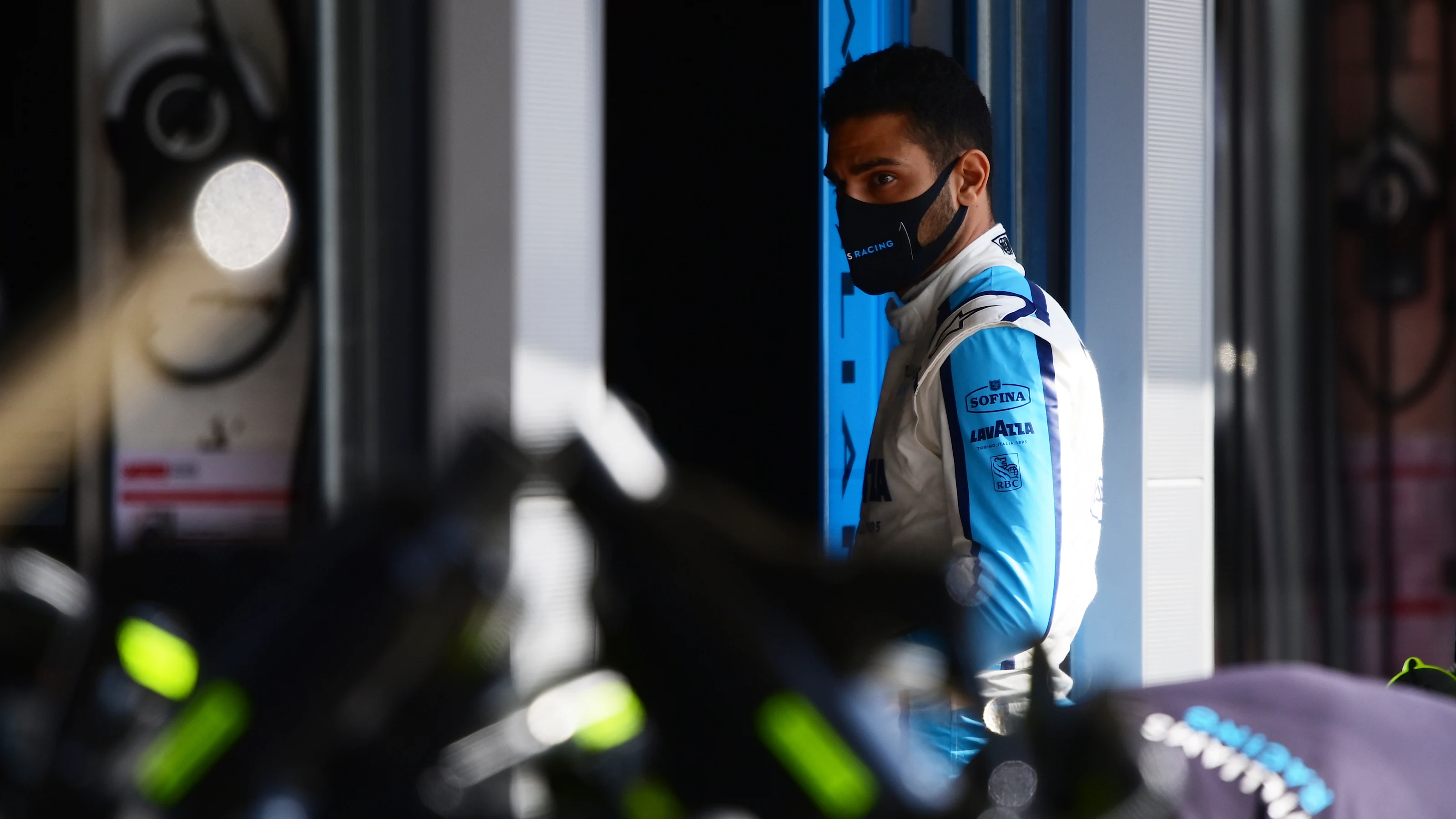 BARCELONA, SPAIN - AUGUST 14: Roy Nissany of Israel and Williams looks on in the Pitlane during