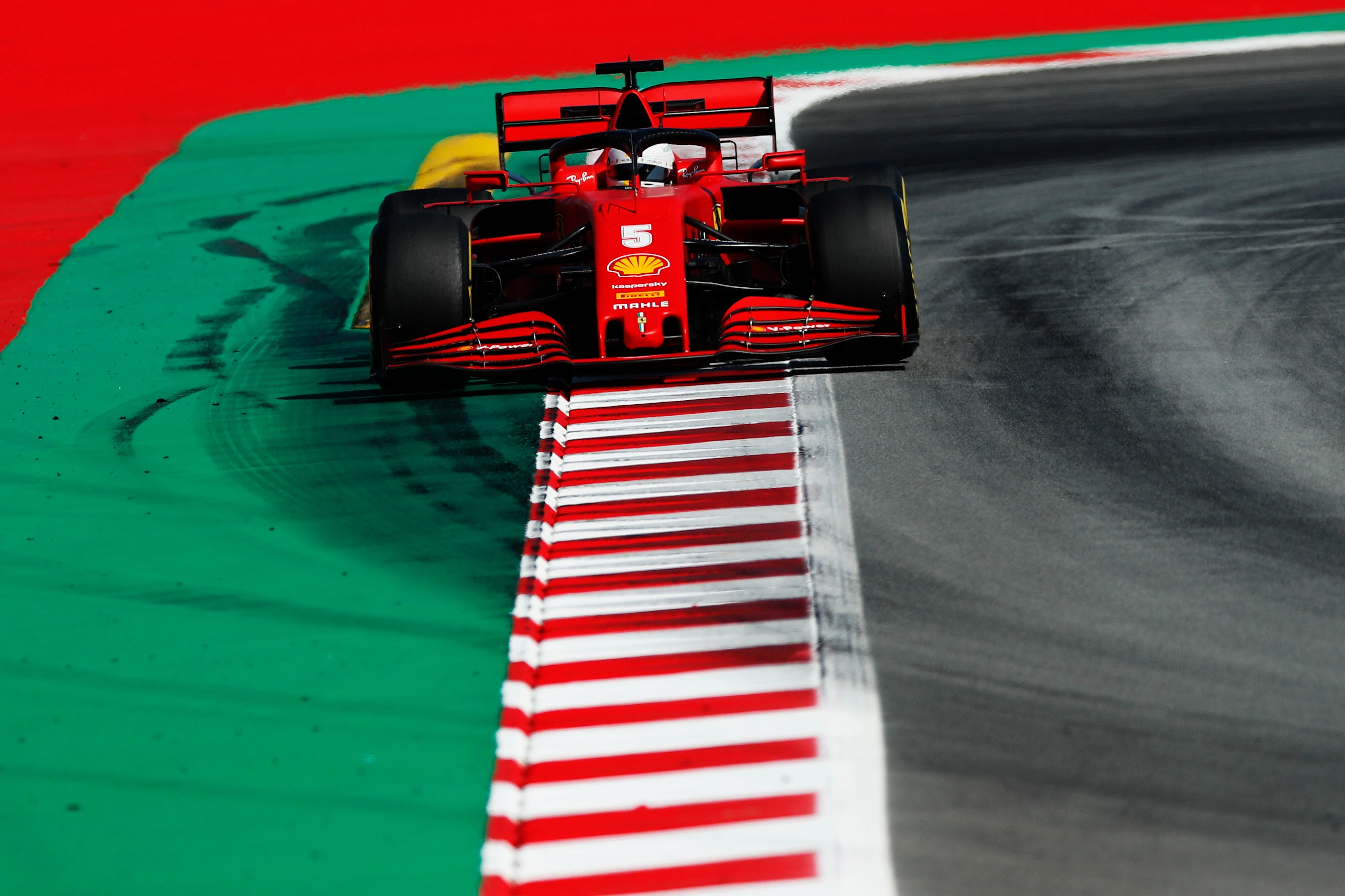 BARCELONA, SPAIN - AUGUST 14: Sebastian Vettel of Germany driving the (5) Scuderia Ferrari SF1000