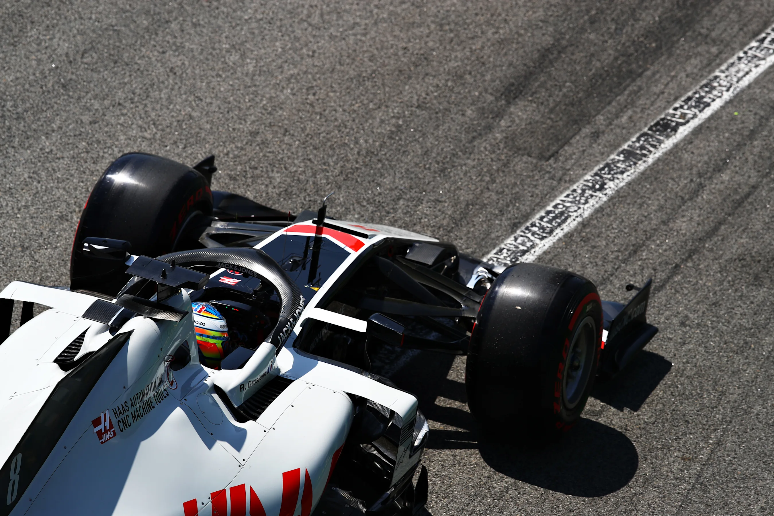 BARCELONA, SPAIN - AUGUST 15: Romain Grosjean of France driving the (8) Haas F1 Team VF-20 Ferrari