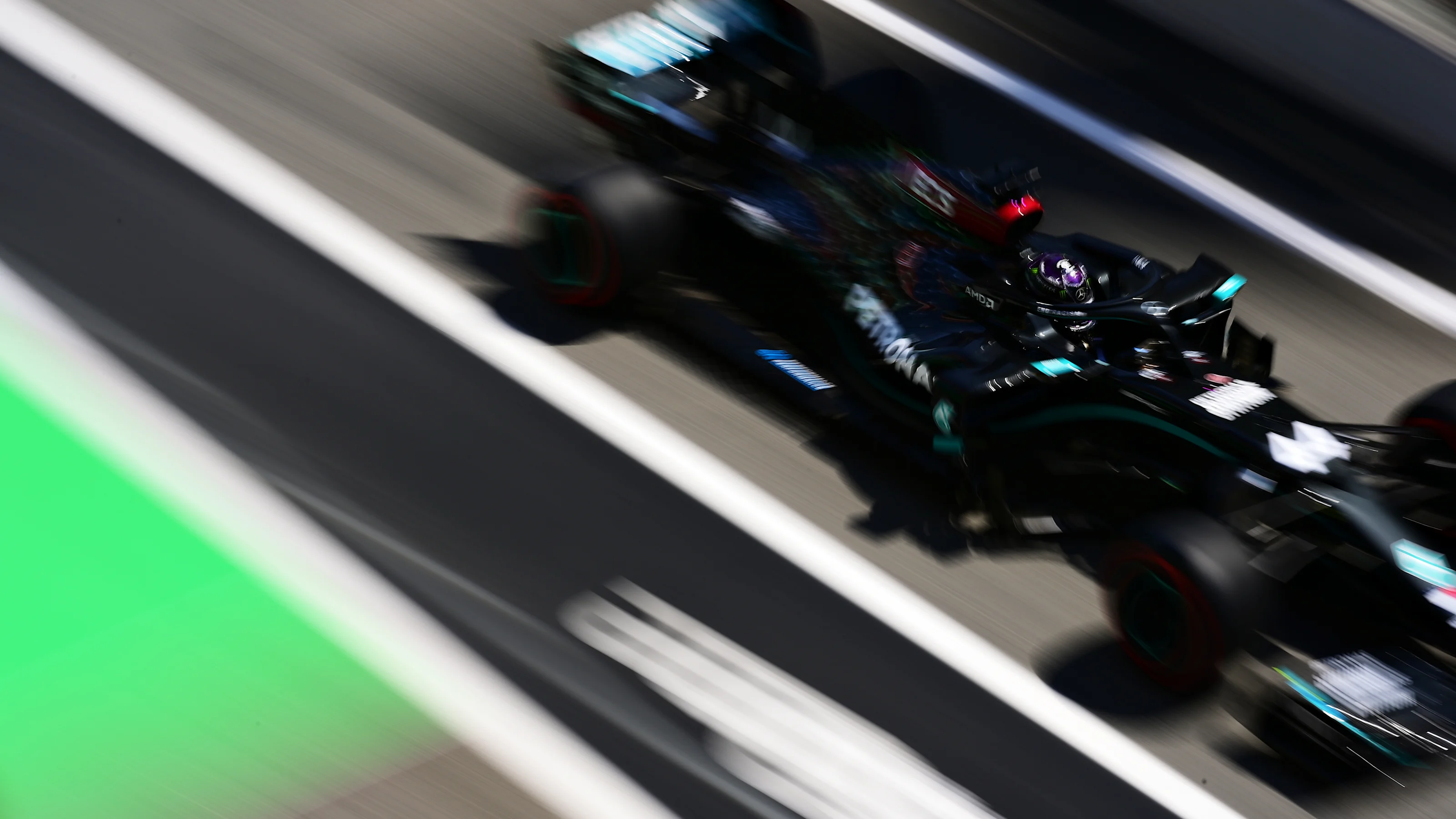 BARCELONA, SPAIN - AUGUST 15: Lewis Hamilton of Great Britain driving the (44) Mercedes AMG