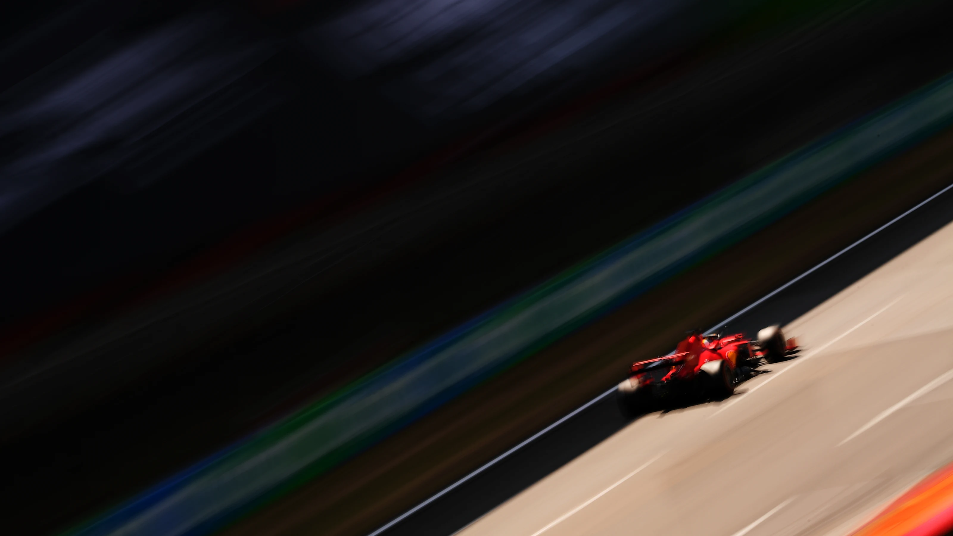 BARCELONA, SPAIN - AUGUST 15: Sebastian Vettel of Germany driving the (5) Scuderia Ferrari SF1000