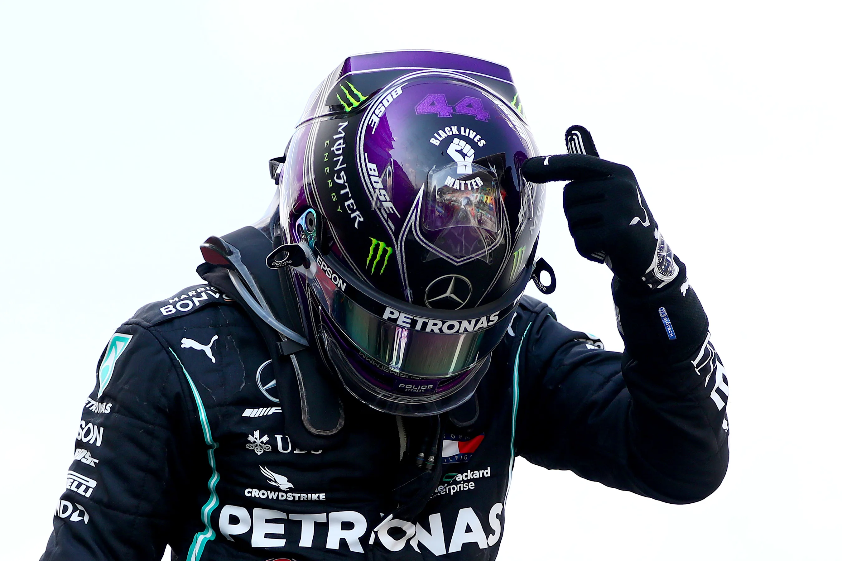 BARCELONA, SPAIN - AUGUST 16: Race winner Lewis Hamilton of Great Britain and Mercedes GP points to