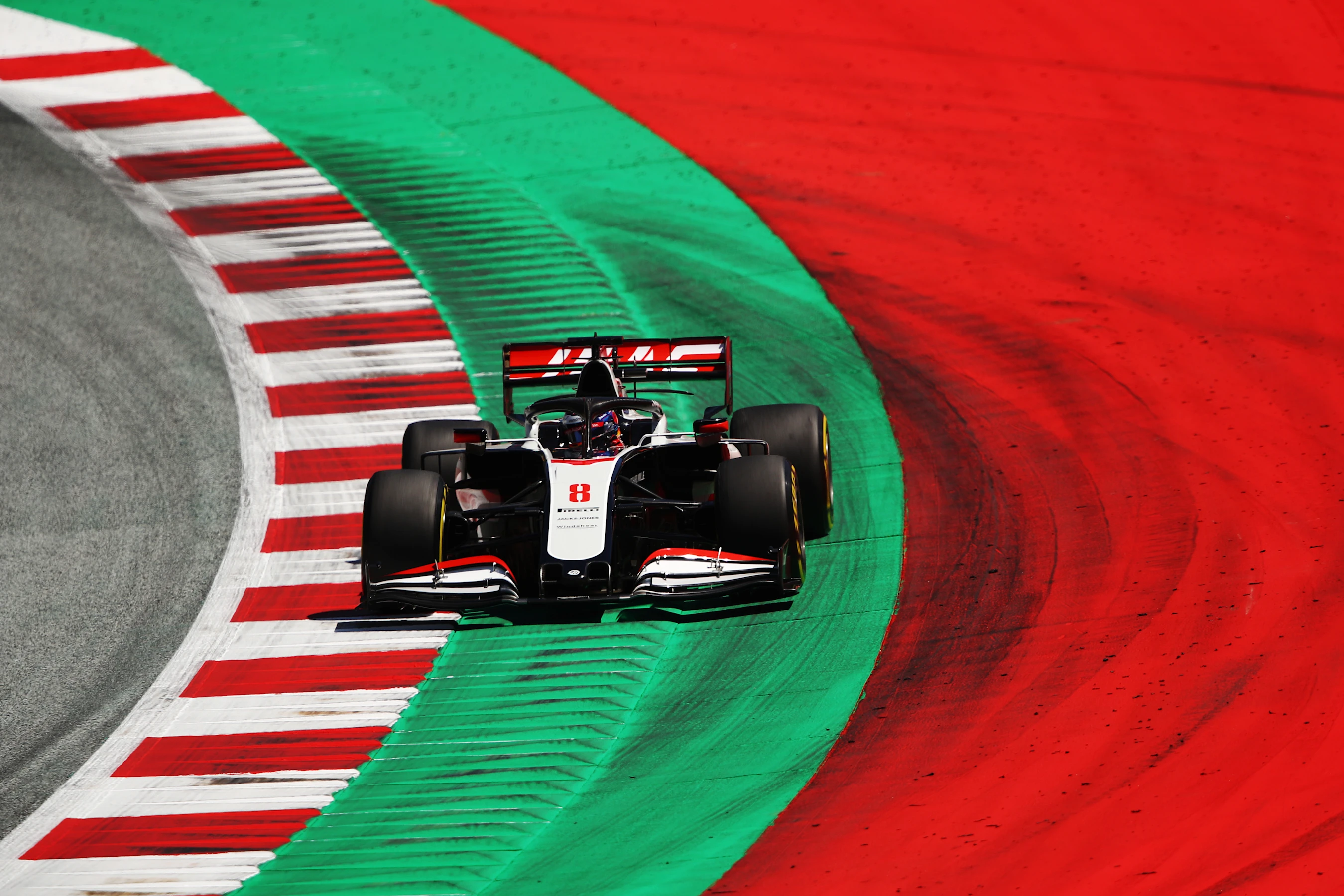SPIELBERG, AUSTRIA - JULY 10: Romain Grosjean of France driving the (8) Haas F1 Team VF-20 Ferrari