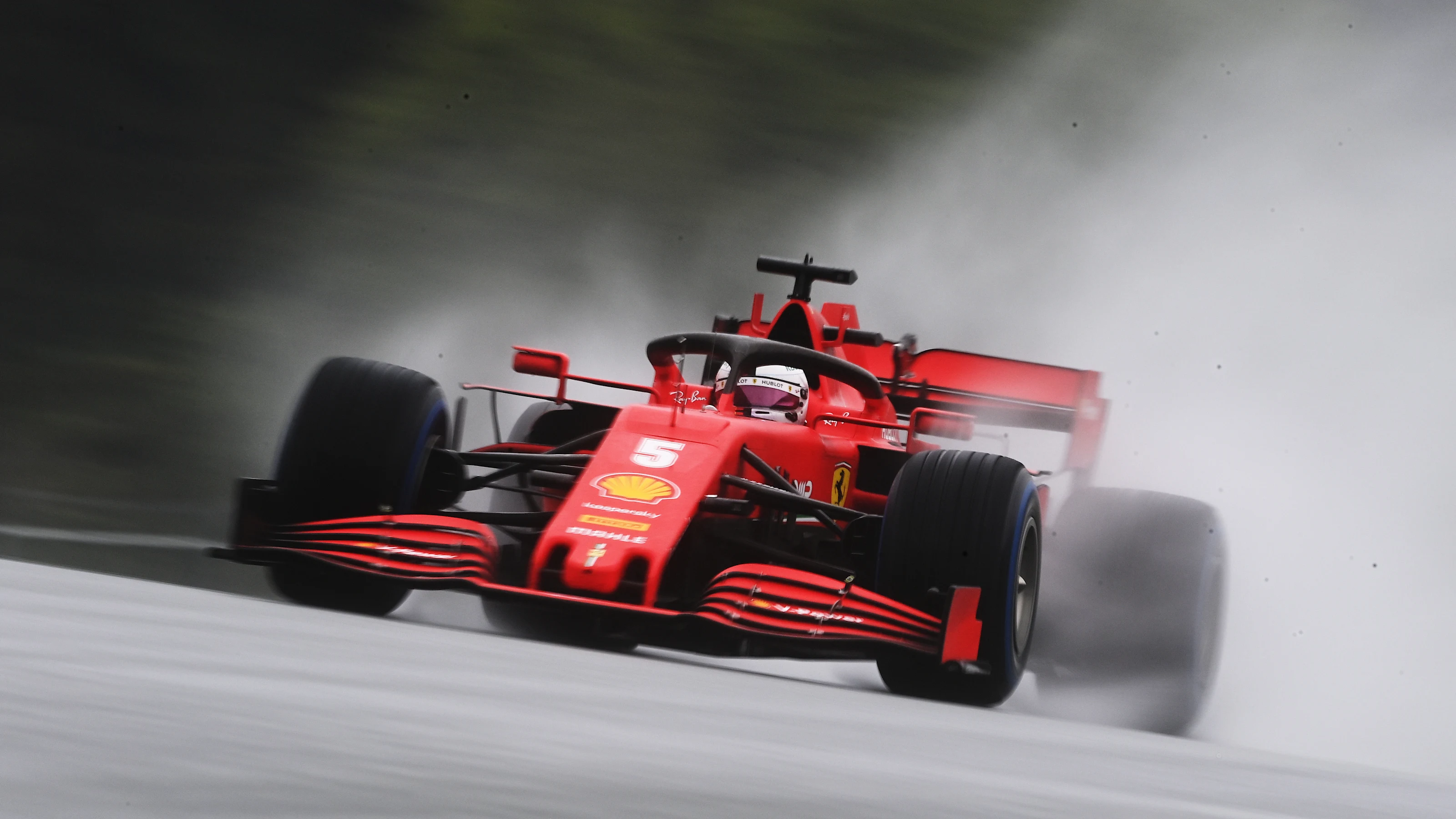 SPIELBERG, AUSTRIA - JULY 11: Sebastian Vettel of Germany driving the (5) Scuderia Ferrari SF1000
