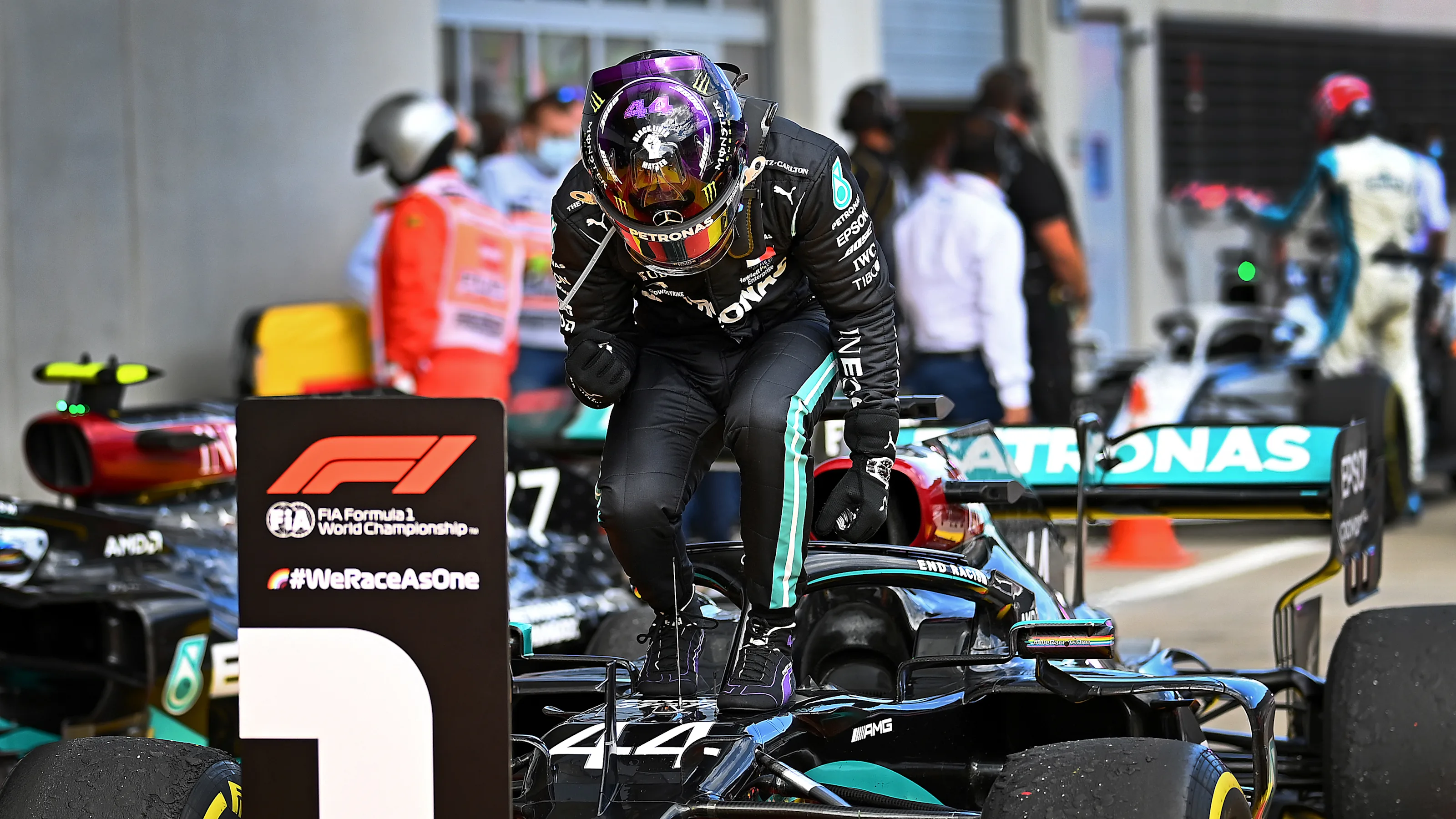 SPIELBERG, AUSTRIA - JULY 12: Lewis Hamilton of Great Britain and Mercedes GP celebrates in parc