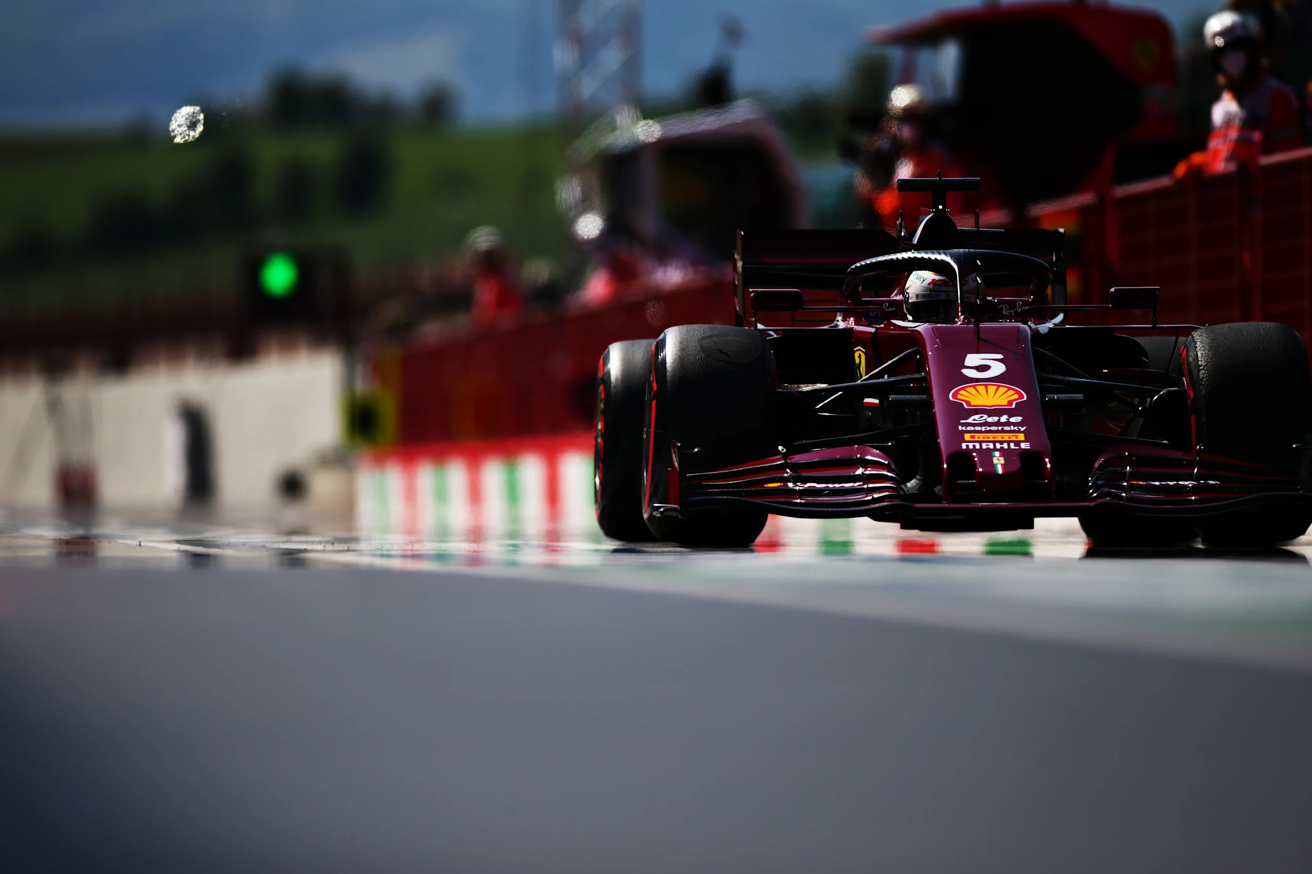 SCARPERIA, ITALY - SEPTEMBER 11: Sebastian Vettel of Germany driving the (5) Scuderia Ferrari