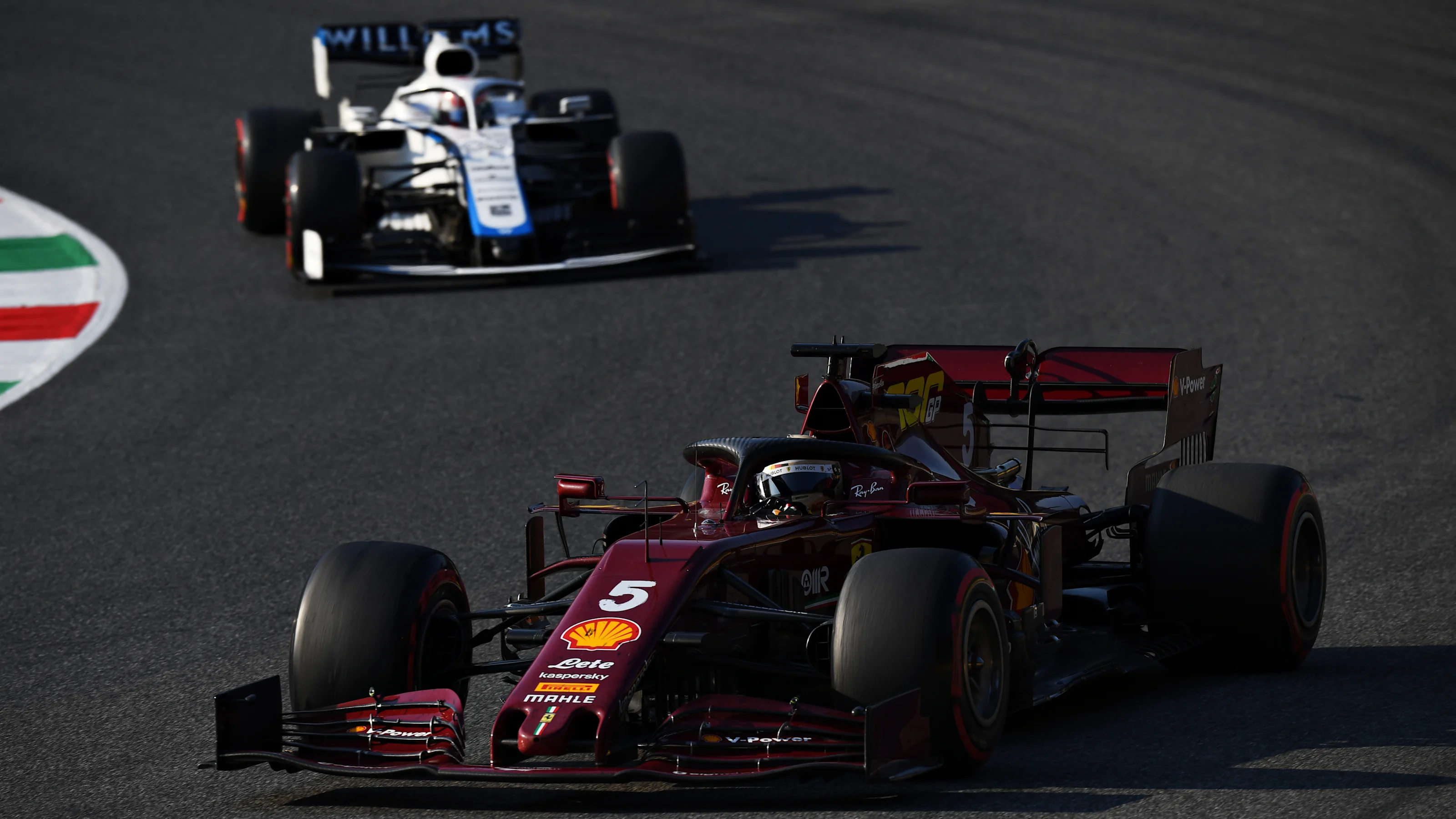 SCARPERIA, ITALY - SEPTEMBER 13: Sebastian Vettel of Germany driving the (5) Scuderia Ferrari